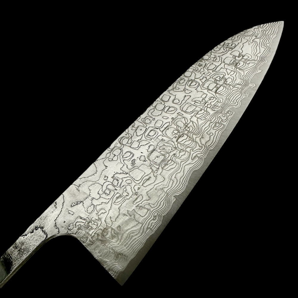SG2 Santoku made by Master Takeshi Saji with diamond Damascus on a black background