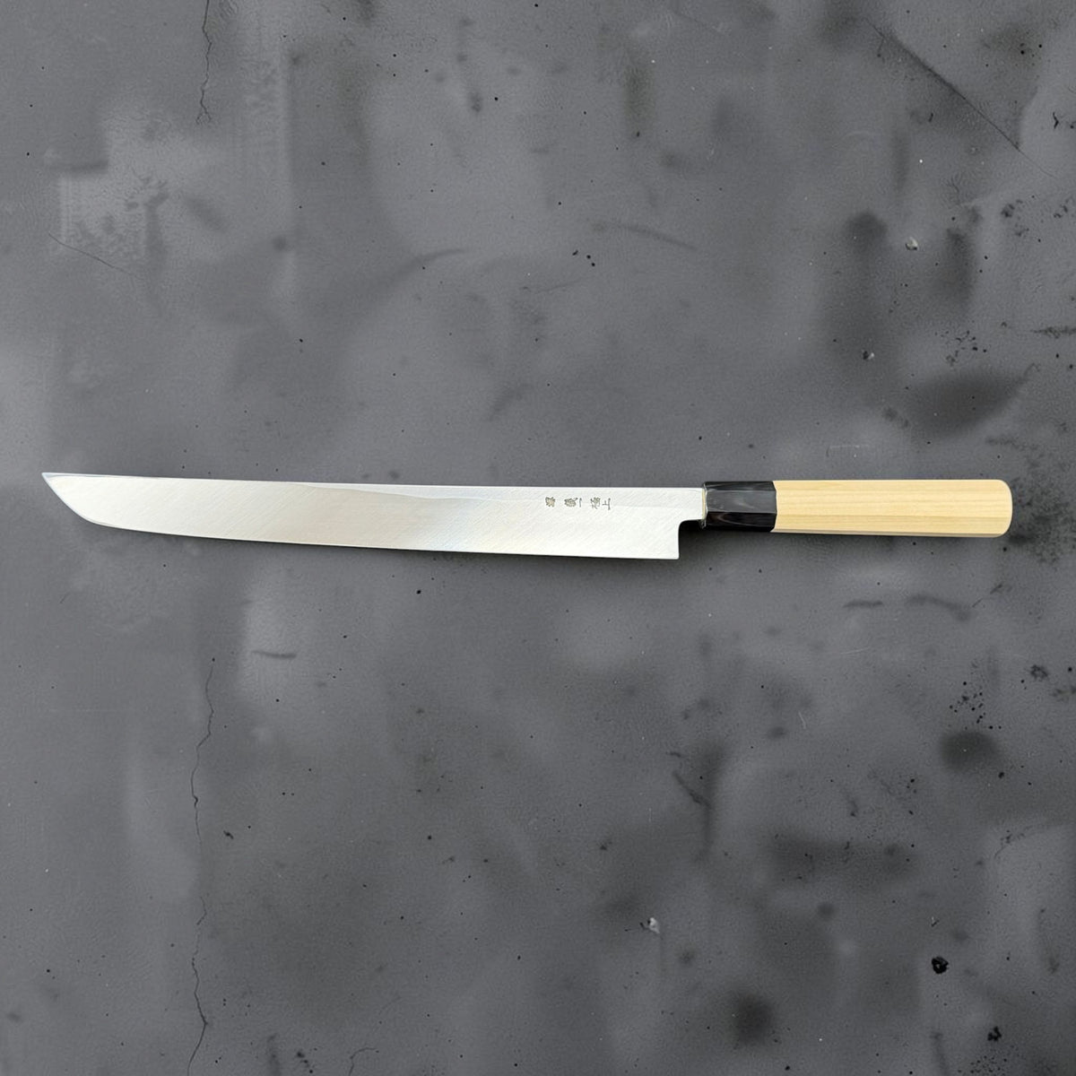 Full reverse-side profile of Yoshikazu Tanaka 300mm sakimaru yanagiba and wooden handle