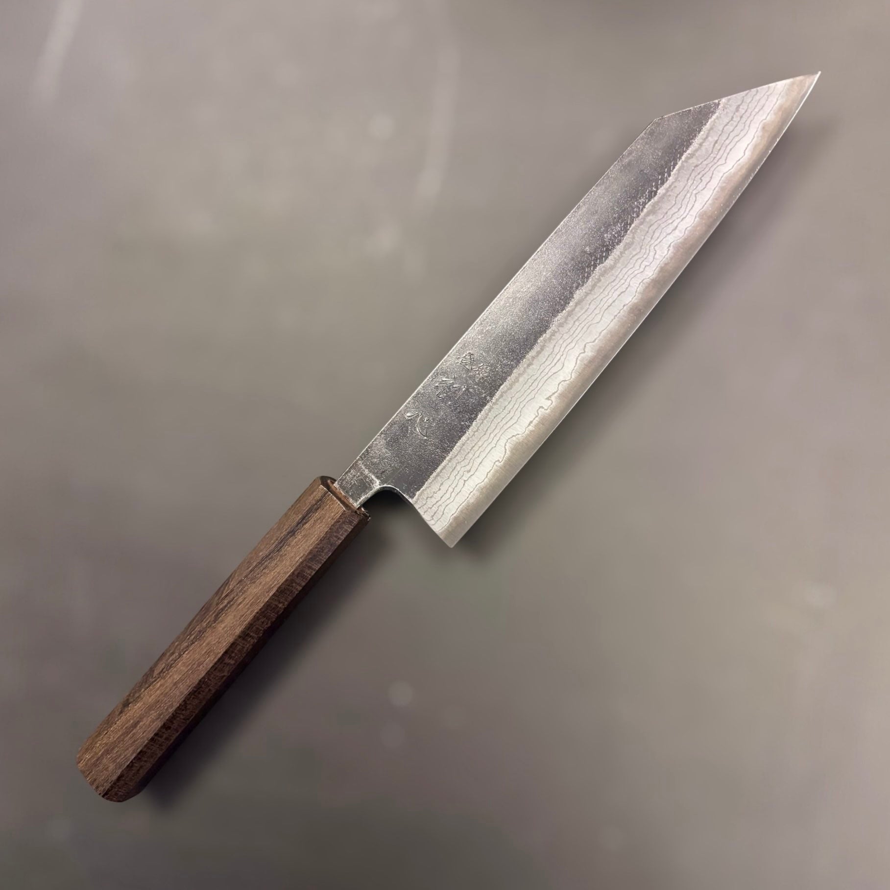 Hatsukokoro Kumokage Blue #2 Bunka 180 mm, reverse‑tanto tip profile showing cloudy damascus pattern.