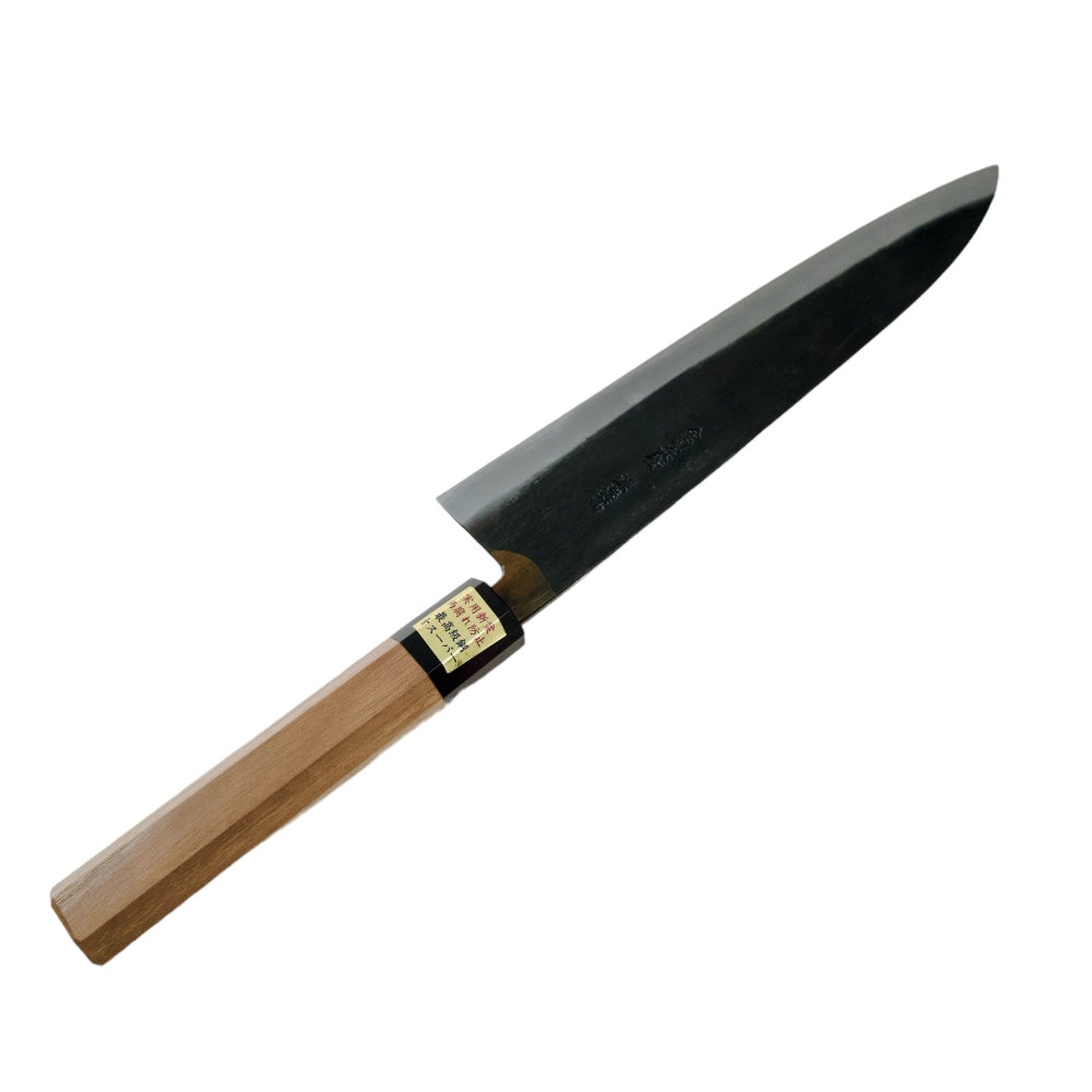 Moritaka gyuto knife upside down showing kanji.