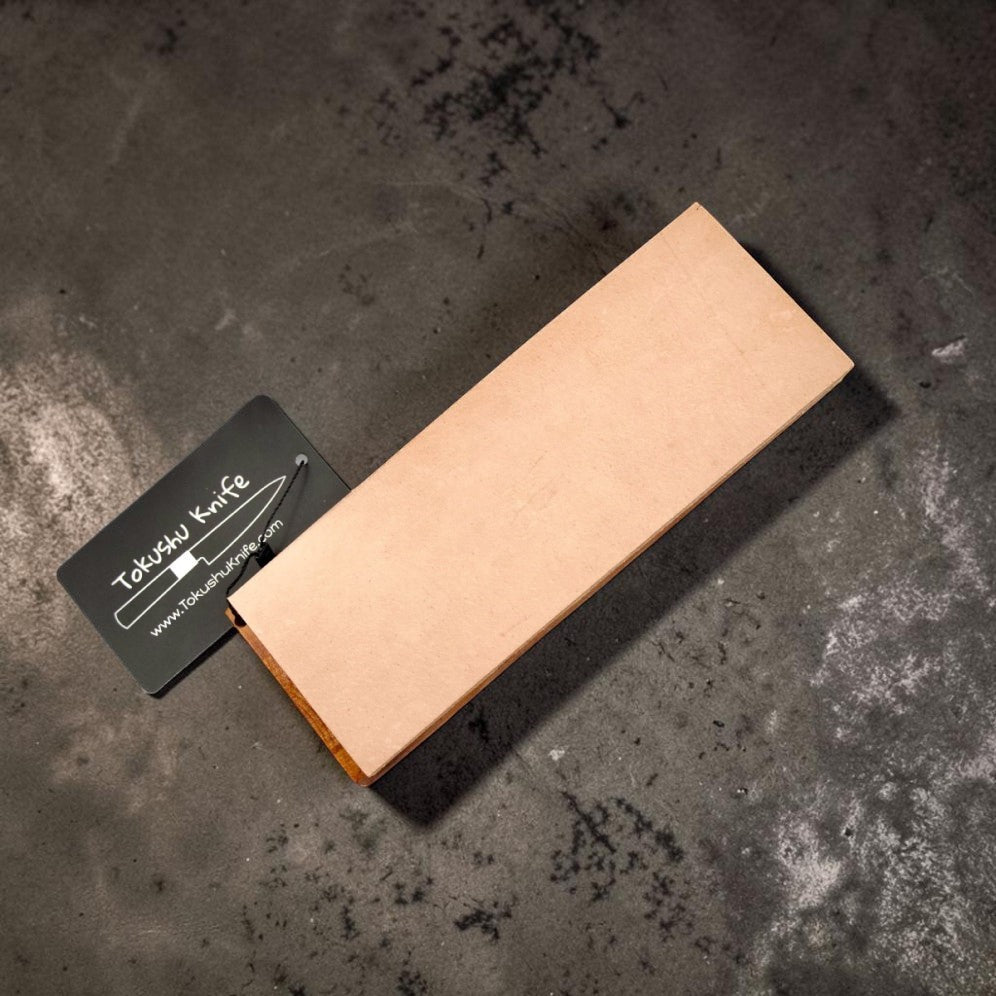 Leather Strop Block by Tokushu knife with logo on black background