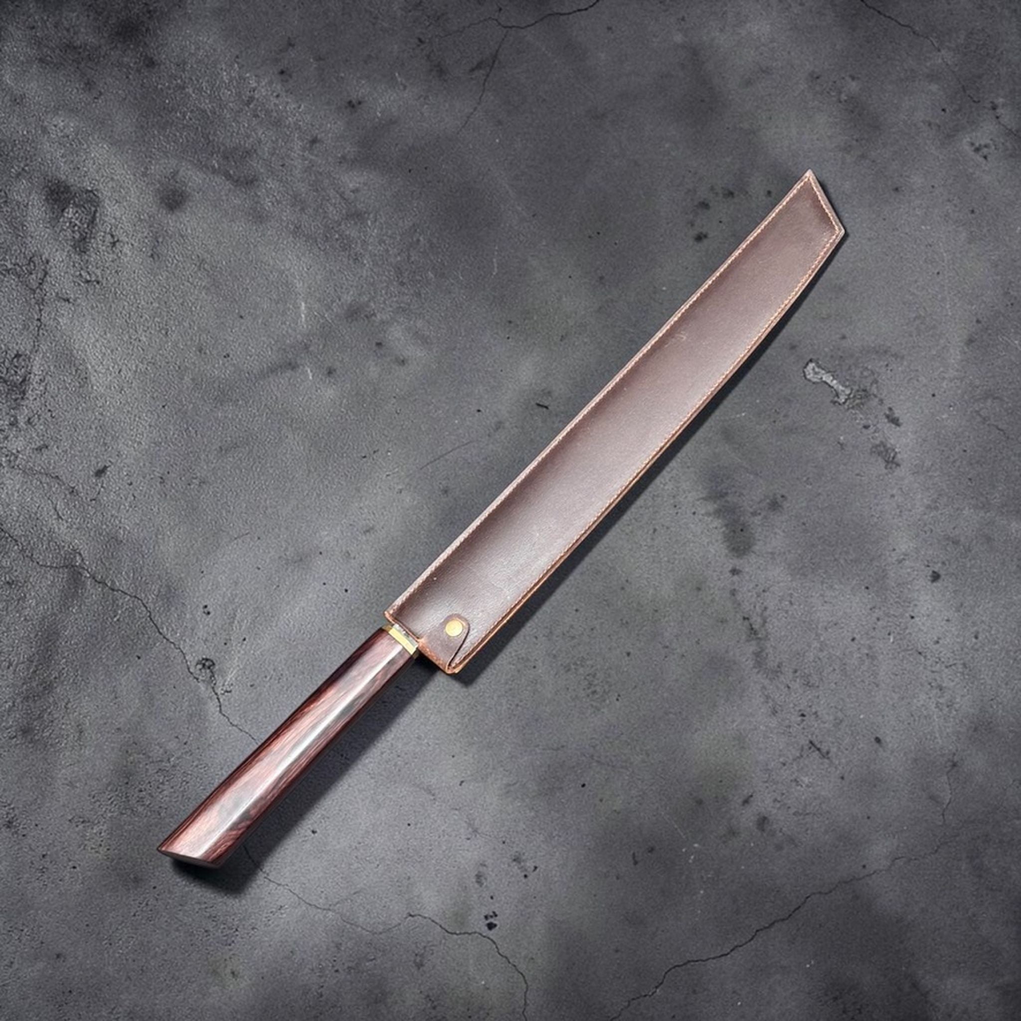 Dao Vua Special Edition Sujihiki Slicer 350 mm with leather saya covering the blade.