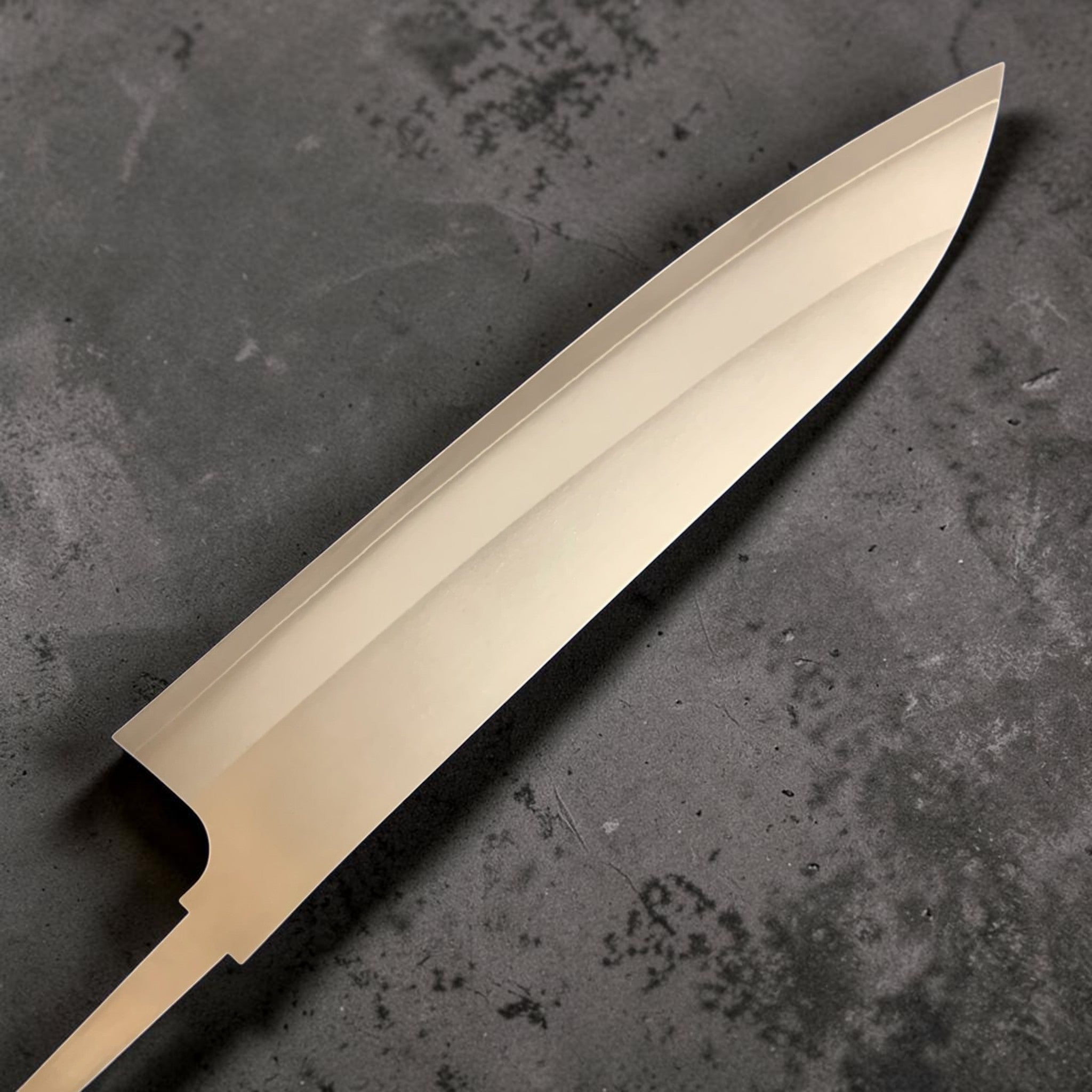 Daruma Hamono Ginsan #3 Gyuto 210 mm, full bare blade on black background, no handle.
