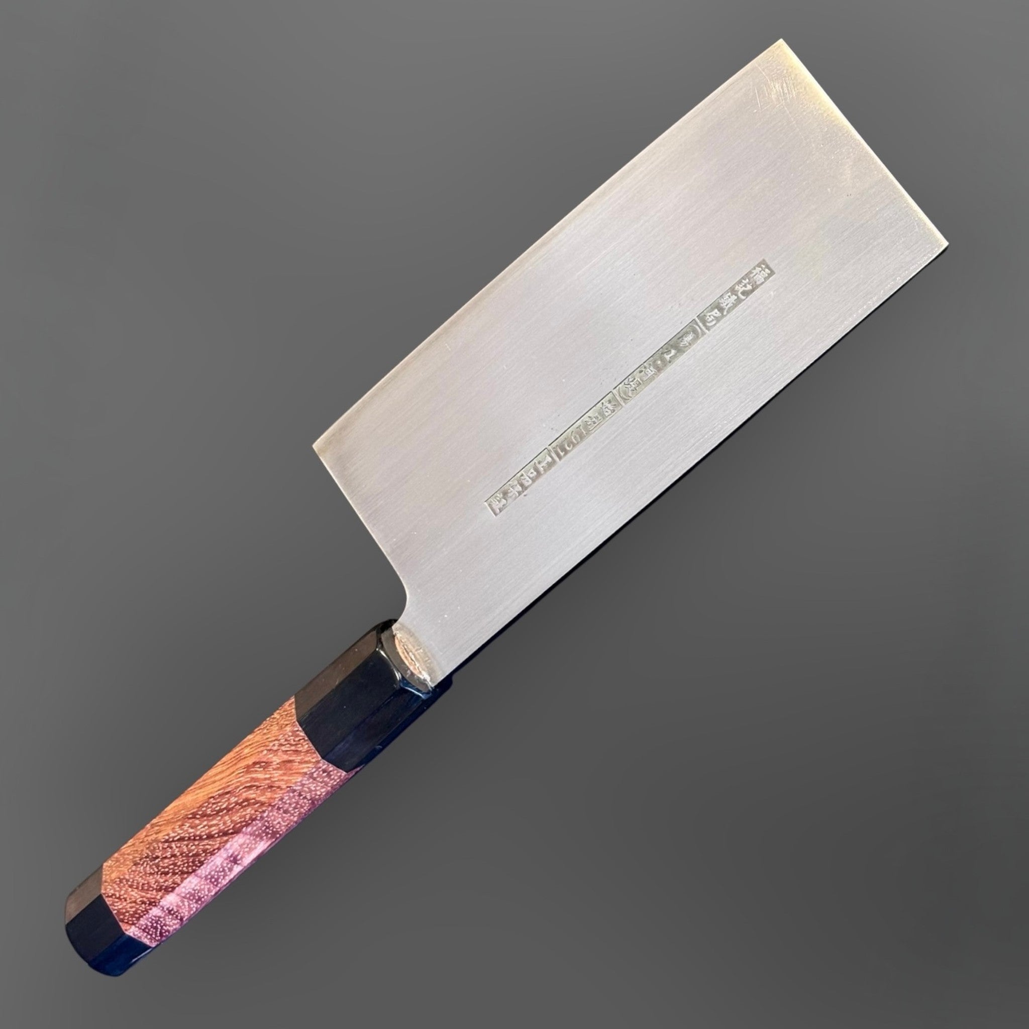 Fook Kee Model #3 stainless steel 180 mm Chinese vegetable cleaver with custom wa handle and buffalo horn accents, close angled view of stamped blade.