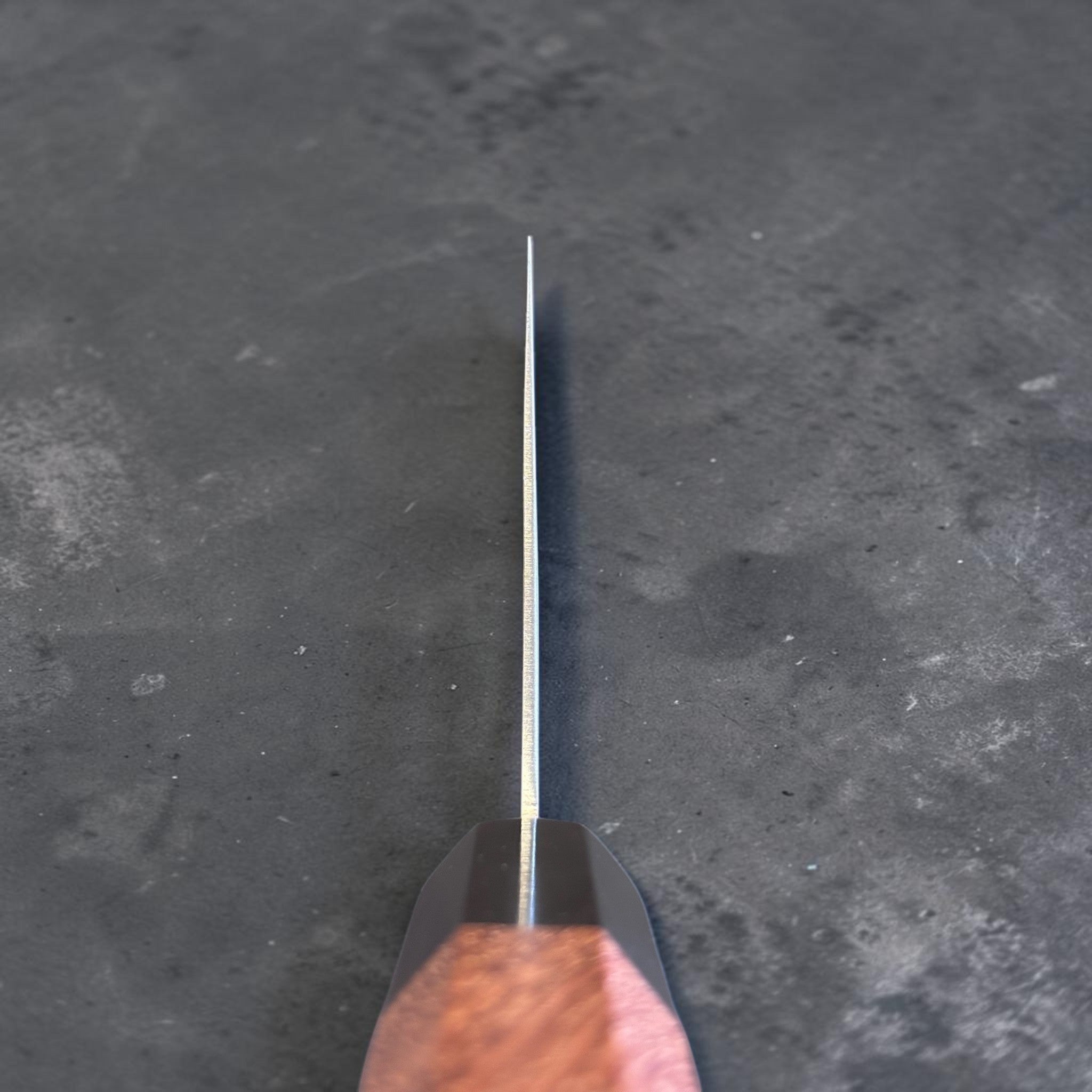 Fook Kee Model #3 stainless steel 180 mm Chinese vegetable cleaver with custom wa handle and buffalo horn accents, choil view showing thin edge geometry.