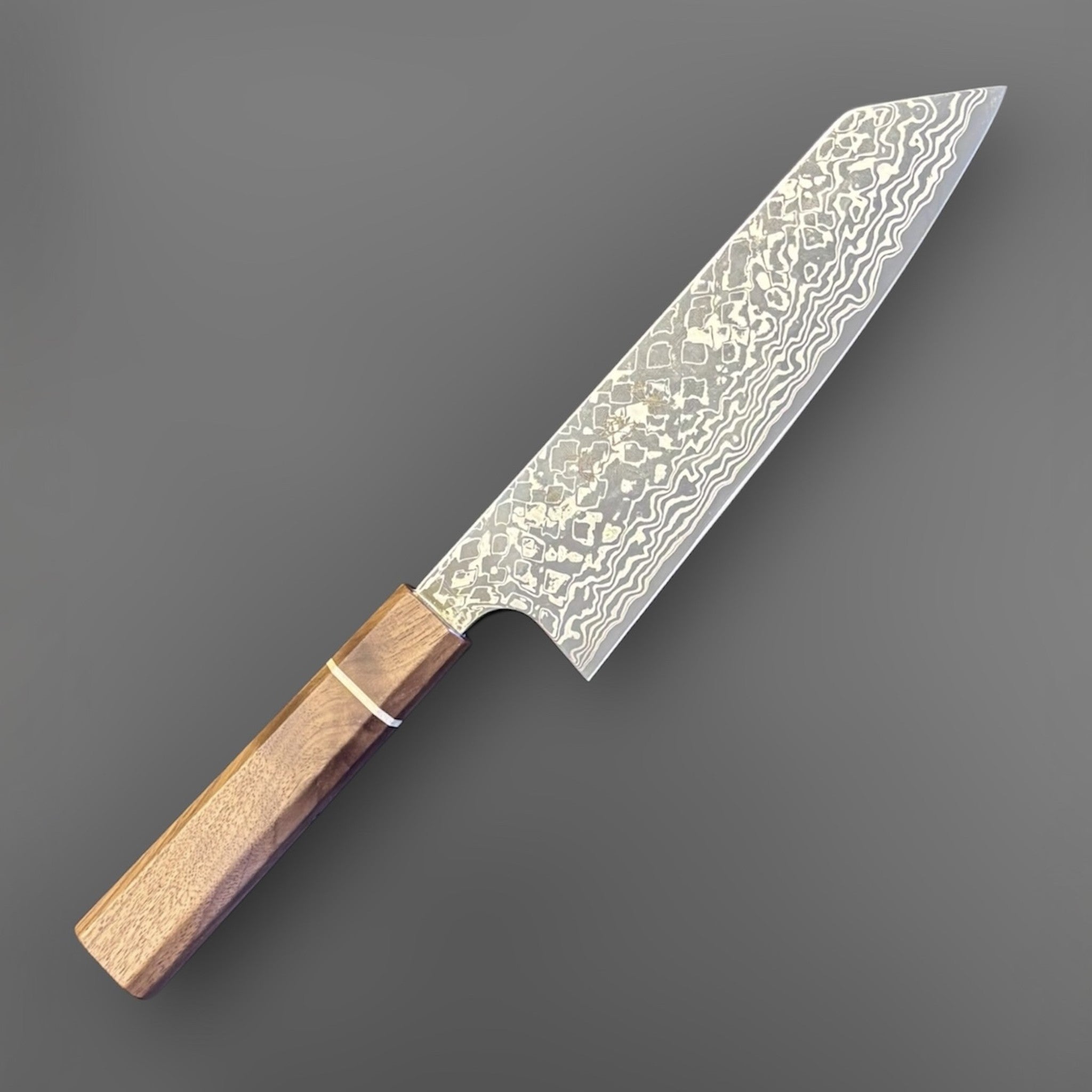 Hatsukokoro Ginga ATS-34 Nickel Damascus Bunka 170 mm with Sanjo walnut handle and maple stripe, angled view showing the blade pattern and handle.