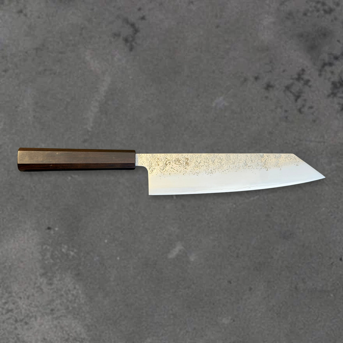 Hatsukokoro Ginrei Ginsan Nashiji 210mm kiritsuke with ebony handle, shown in horizontal front profile with the full blade and handle visible.