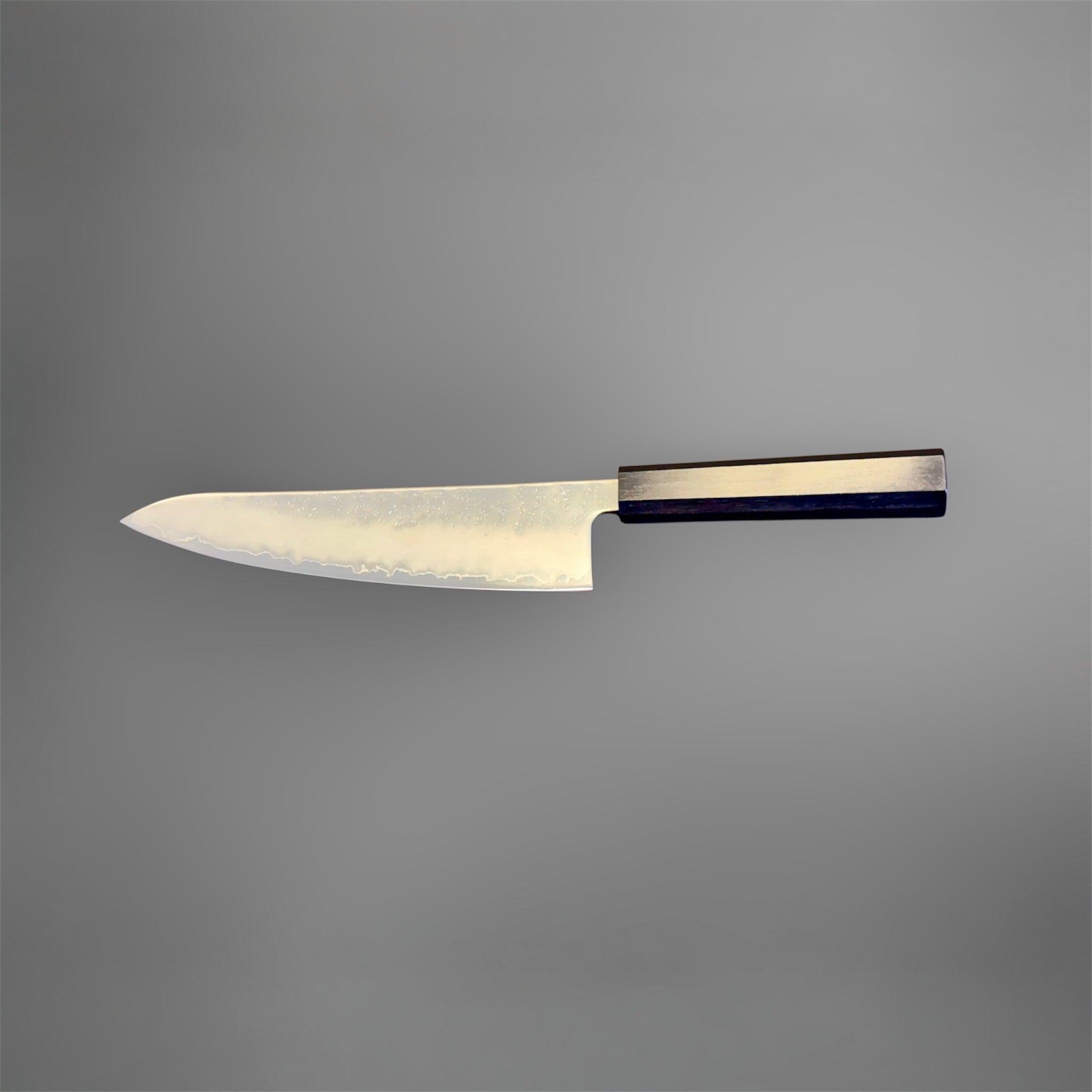 Hatsukokoro Ginrei Silver #3 Gyuto 210 mm with mono ebony handle, reverse horizontal full profile view.