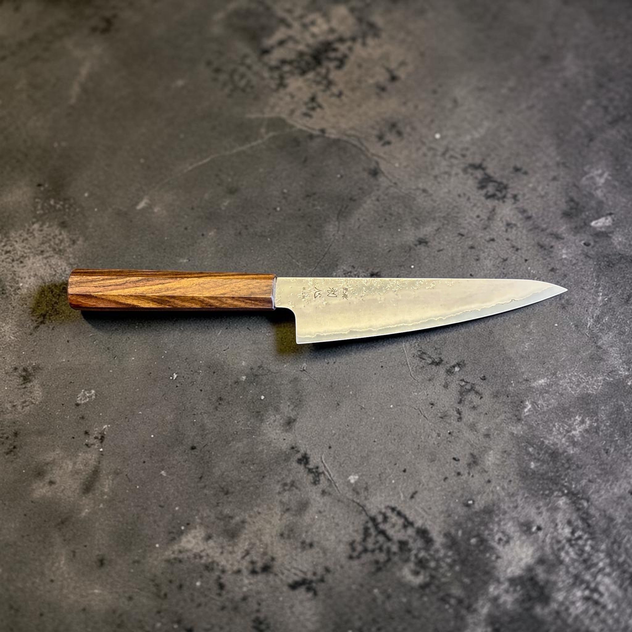 Hatsukokoro Ginrei Silver #3 Ko Santoku 150 mm with mono ebony handle, full side profile showing blade shape.