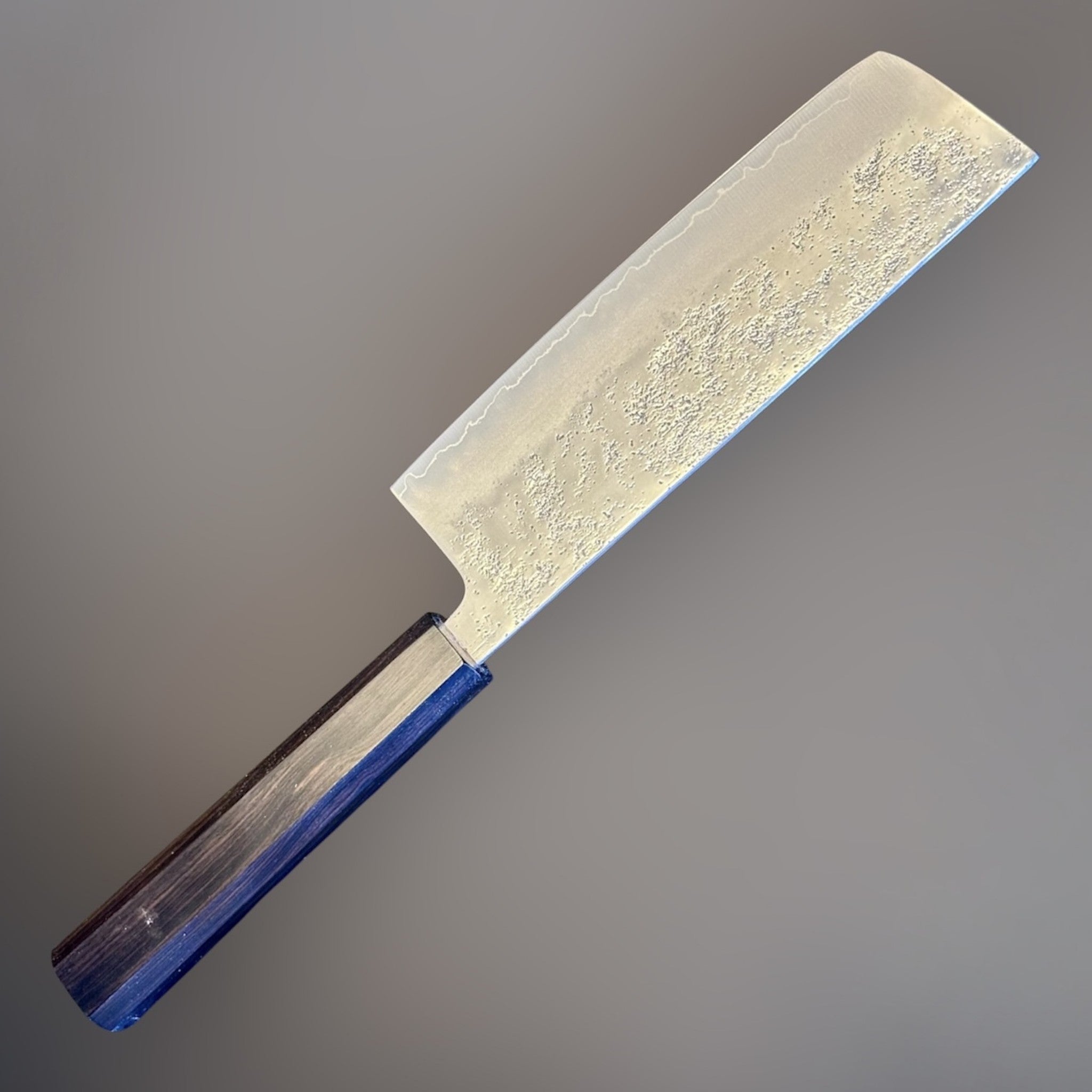 Hatsukokoro Ginrei Silver #3 Nakiri with mono ebony handle, angled full-knife product view.