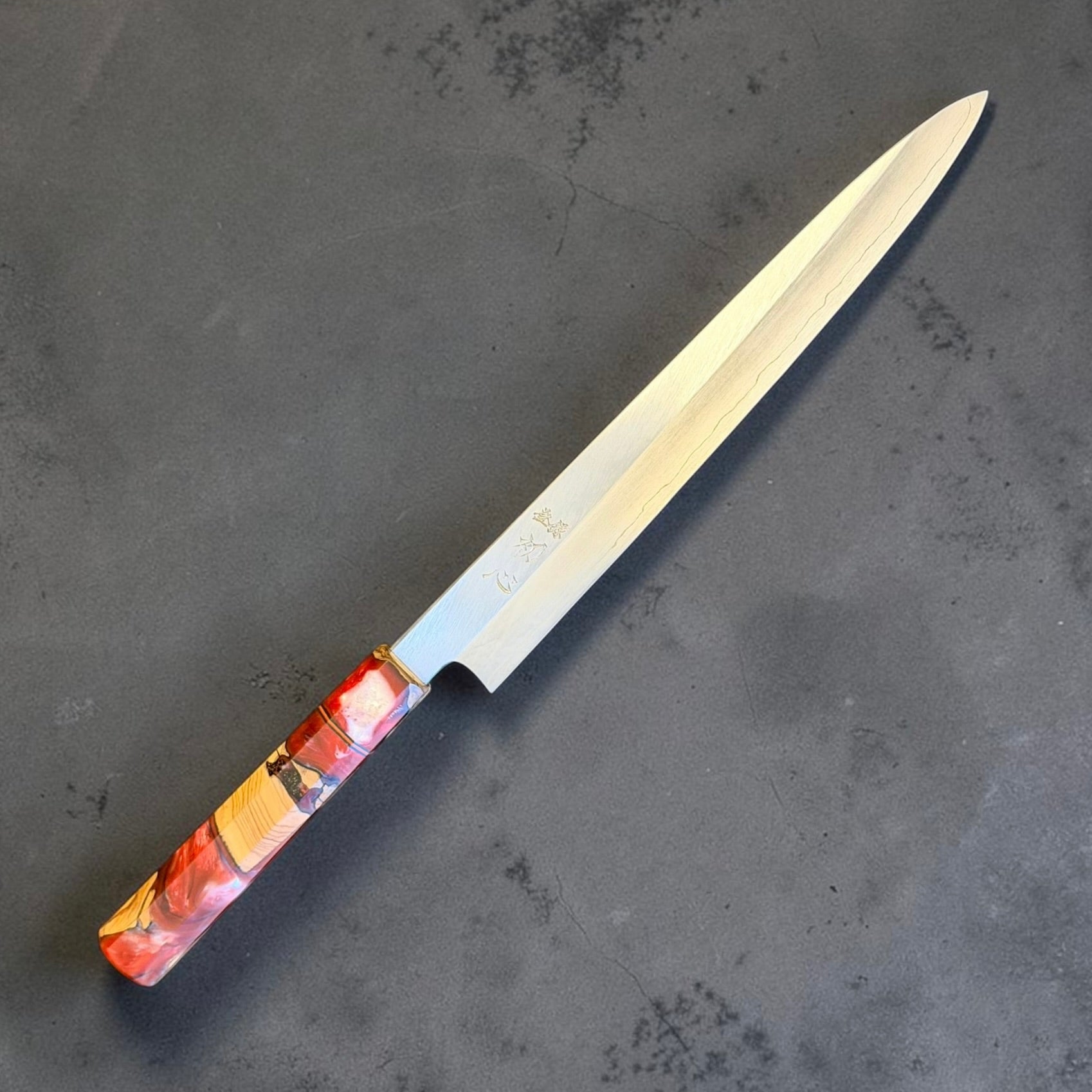 Hatsukokoro Satoshi Nakagawa Silver #3 Sujihiki 270mm with red wood and resin Prisma handle, angled kanji-side view