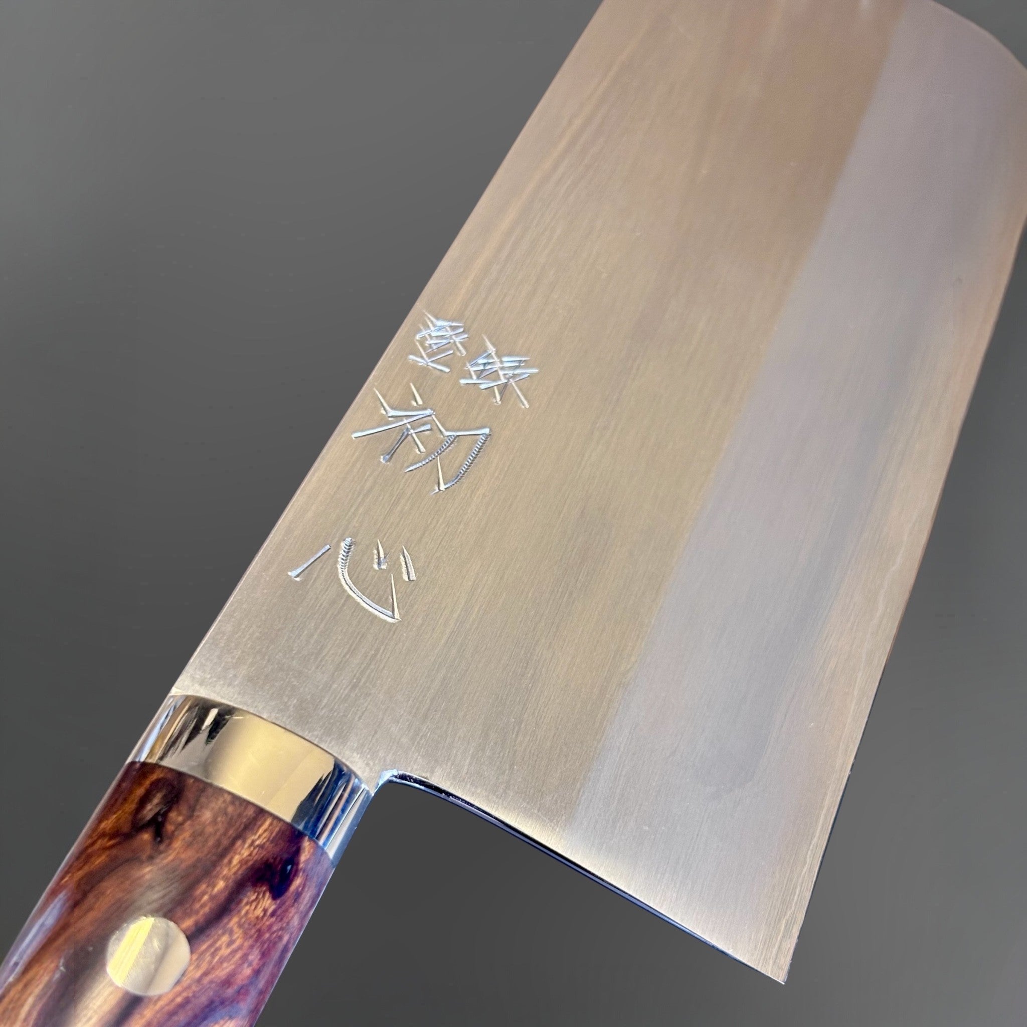 Hatsukokoro Nakagawa Satoshi Silver #3 Chinese Cleaver with ironwood handle, close-up of the blade face, kanji engraving, choil area, and ironwood handle.