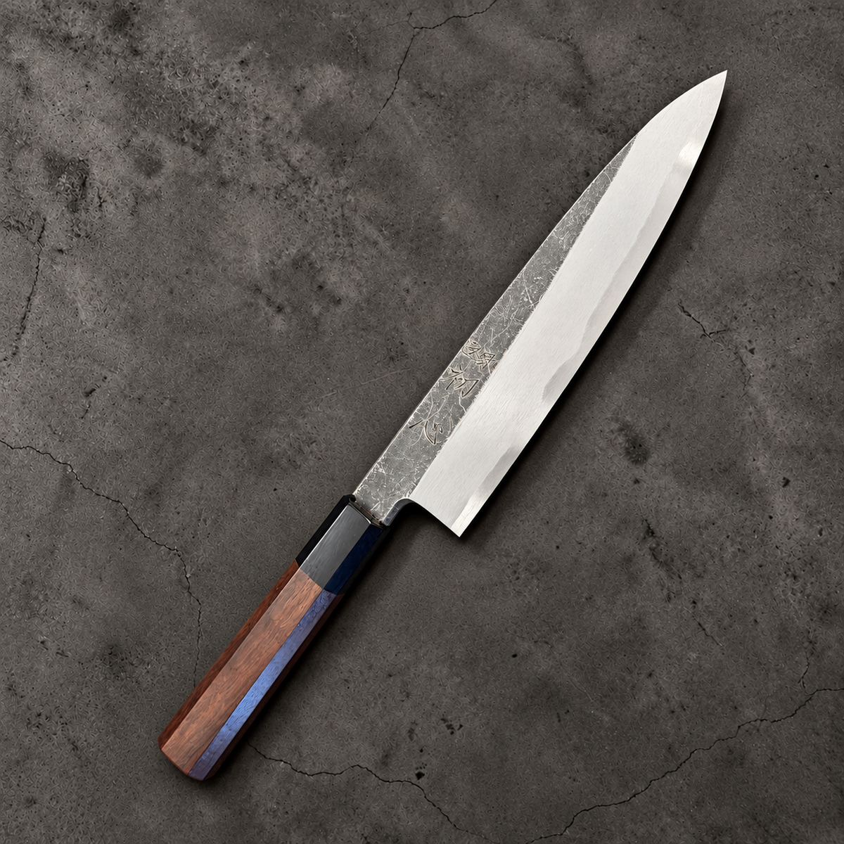Hatsukokoro Shirasagi Blue #2 single bevel gyuto 210mm with walnut handle, engraved side angled view