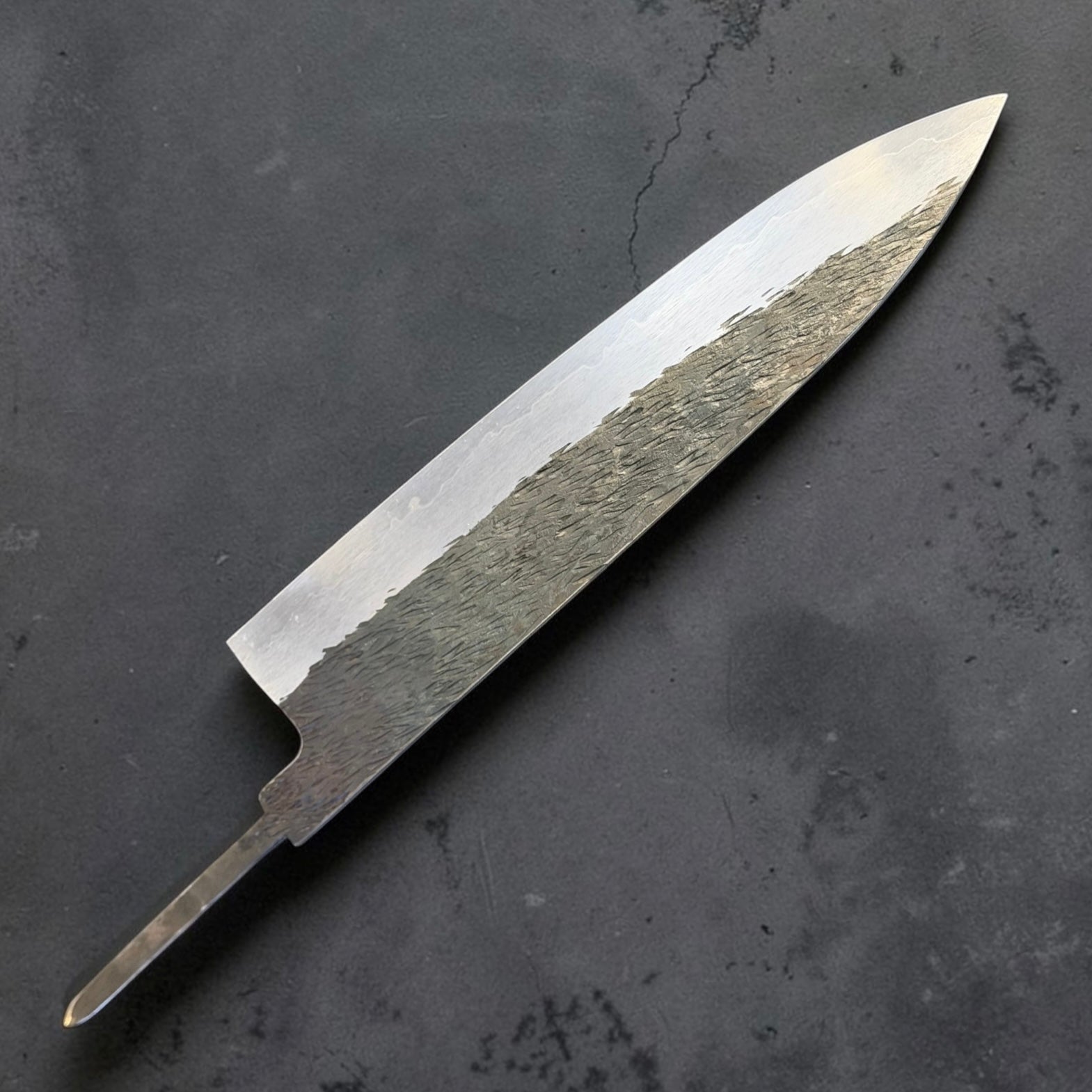 Isamitsu AS gyuto 240mm blade only reverse side angled view