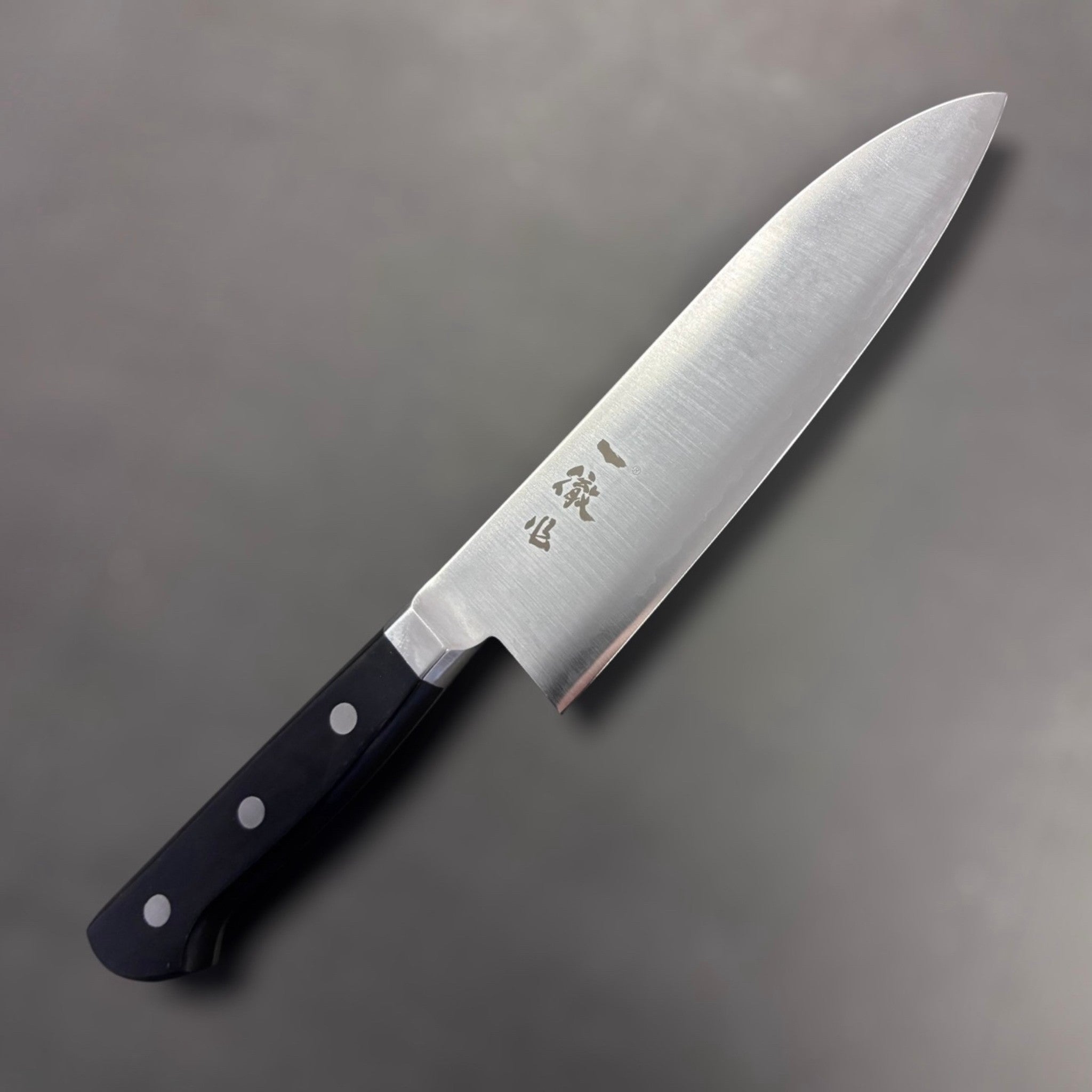 Ittetsu AS Santoku 180 mm, reverse side with brushed finish and Yo handle.