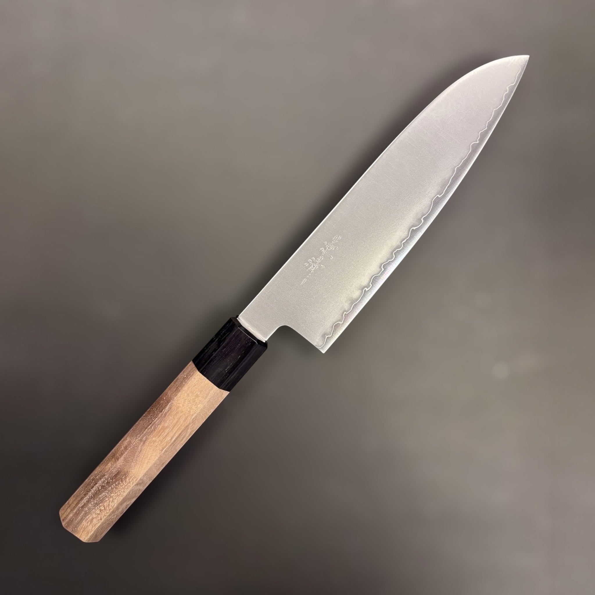 Kagekiyo Chromax Santoku 170 mm, right side profile highlighting the satin blade finish and wavy cladding line.