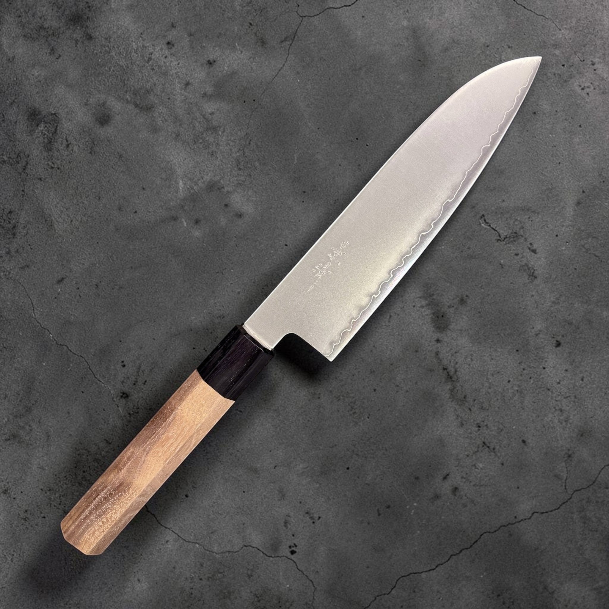 Kagekiyo Chromax Santoku 170 mm, right side profile highlighting the satin blade finish and wavy cladding line.