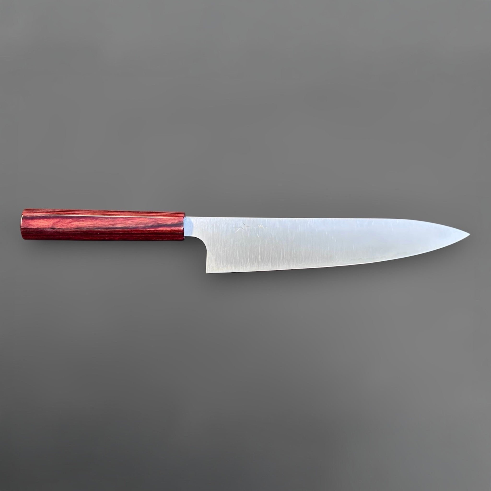 Kei Kobayashi SG2 Gyuto 210 mm with red lacquer handle, full side profile showing the long satin-finished blade and minimalist wa handle.