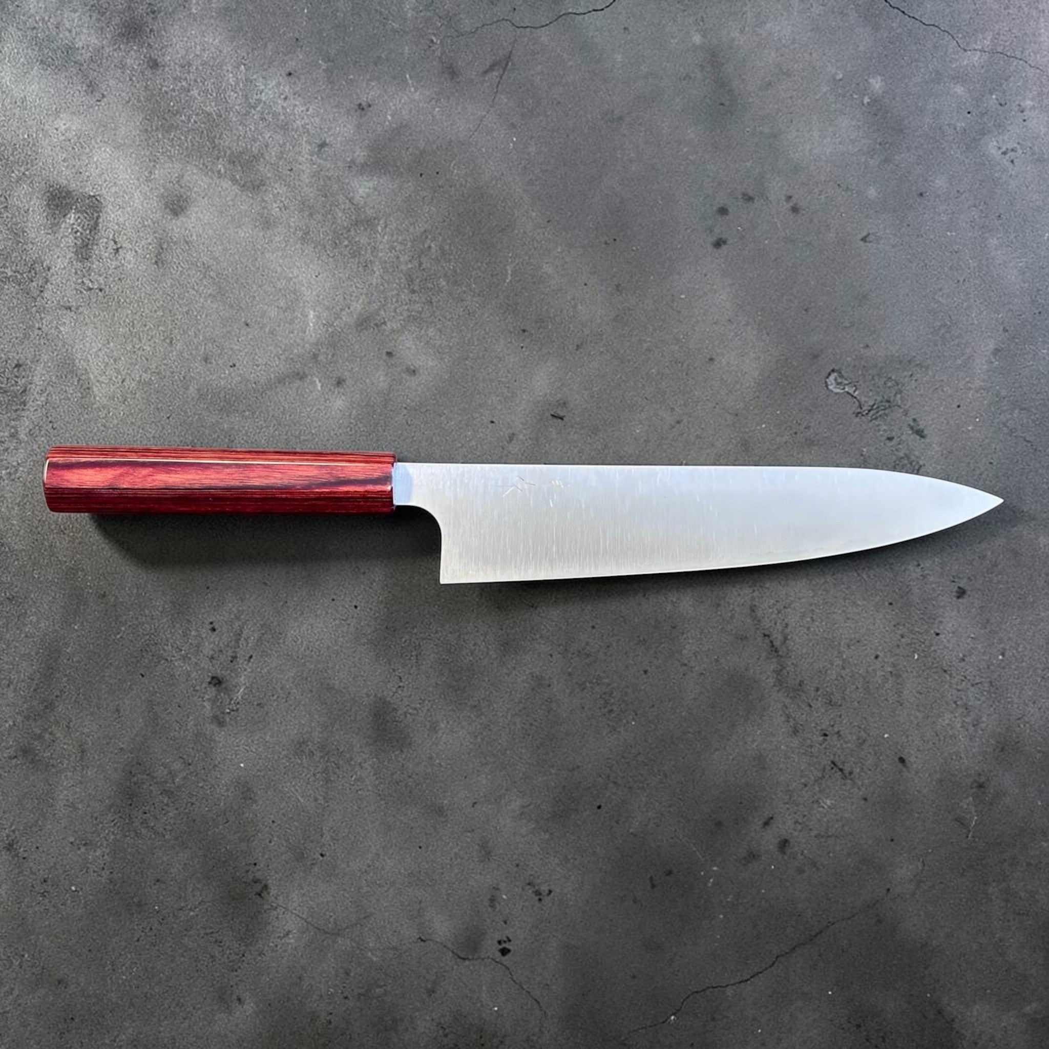 Kei Kobayashi SG2 Gyuto 210 mm with red lacquer handle, full side profile showing the long satin-finished blade and minimalist wa handle.