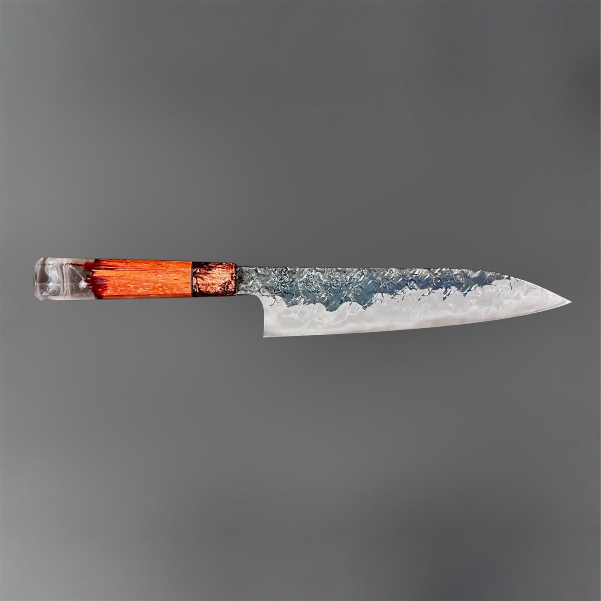 Kisuke Manaka ENN Gyuto 210 mm with Prisma Knife handle, side profile showing the long gyuto blade, textured finish, and orange-gray custom handle.