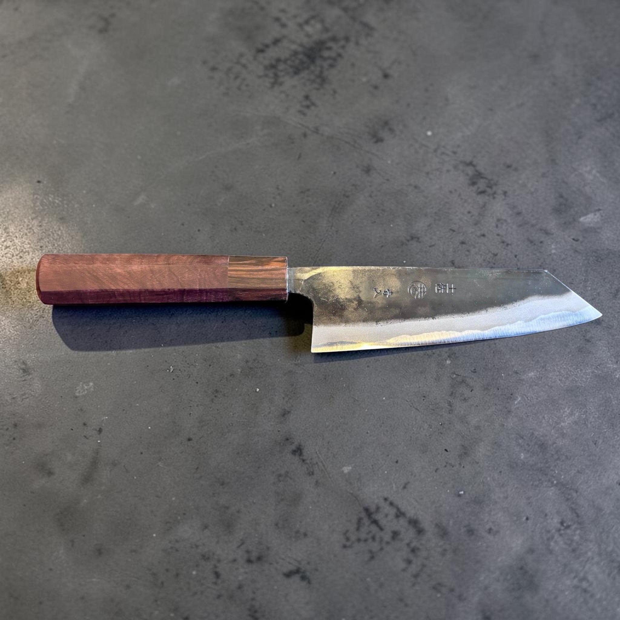 Kyohei Shindo Blue #2 Bunka 170 mm, rosewood and ebony wa handle profile shot.