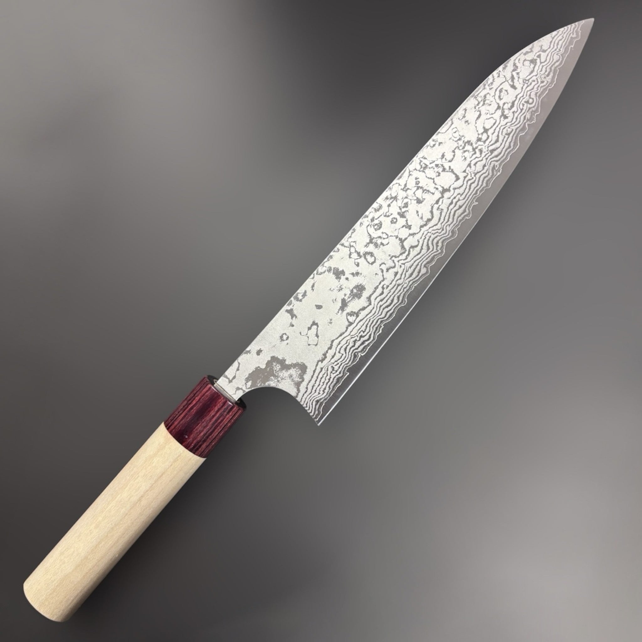 Masakage Kiri Damascus Gyuto 210 mm, angled hero shot showing Damascus pattern along the blade.