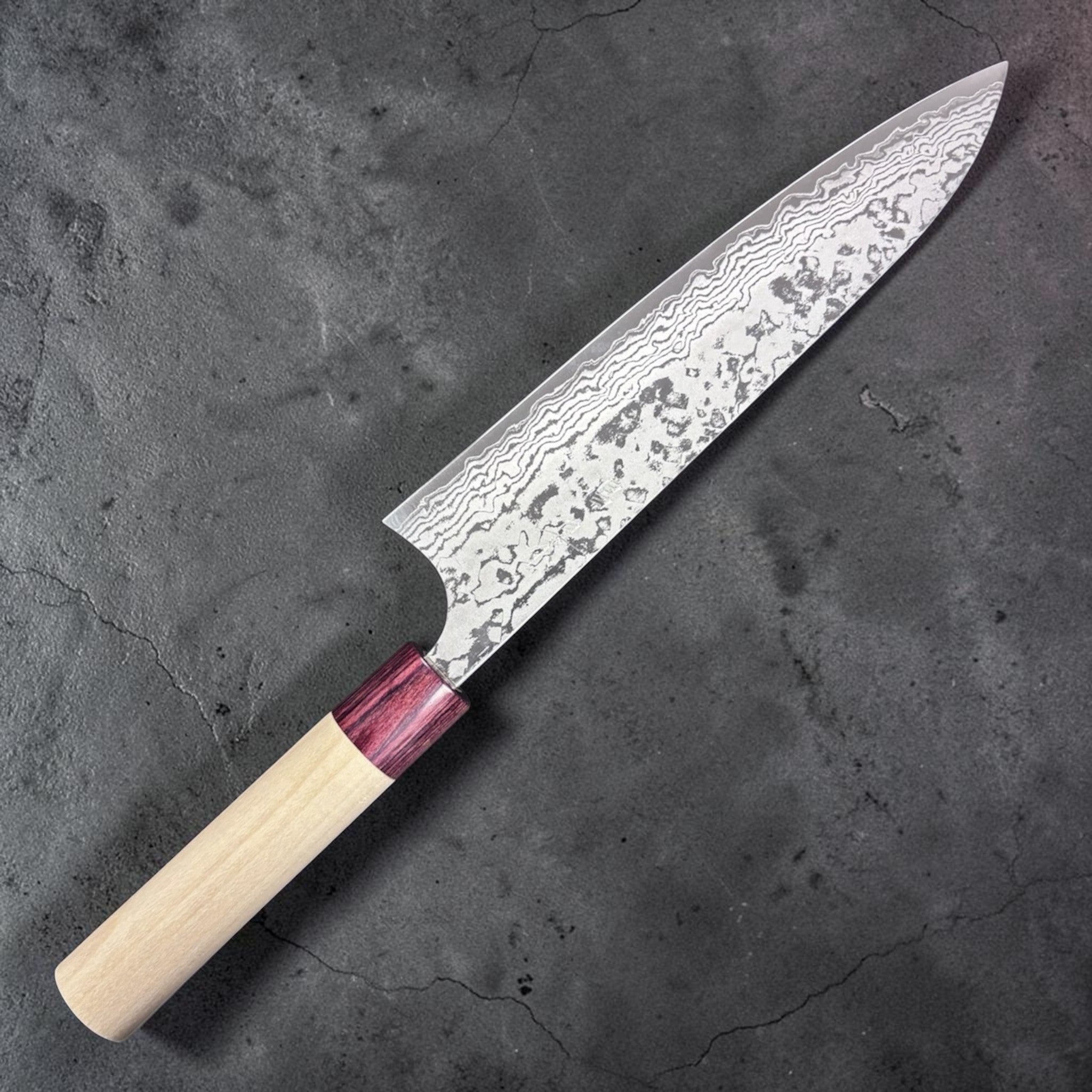 Masakage Kiri Damascus Gyuto 210 mm, alternate angle highlighting blade curvature and wa handle.