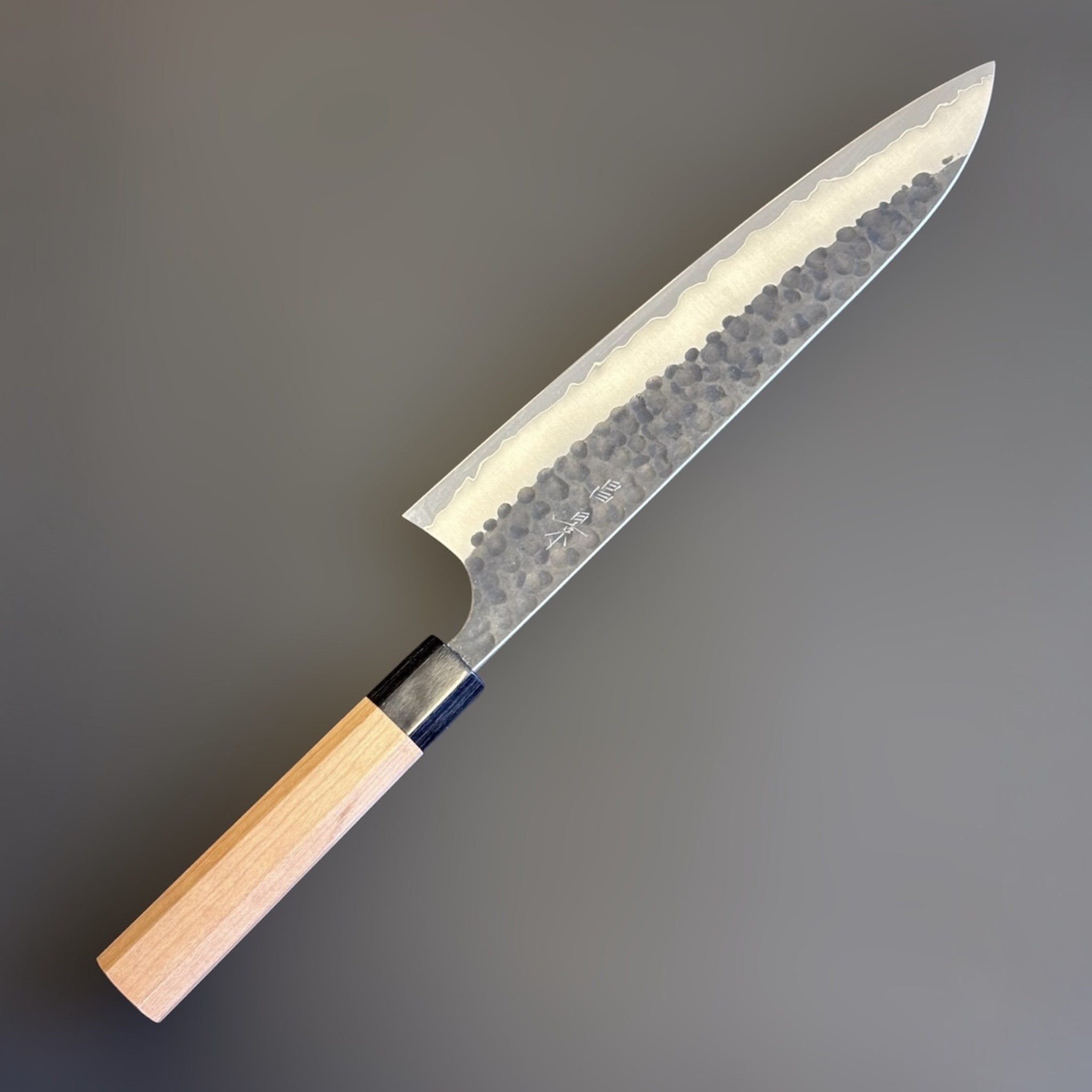Masakage Koishi Gyuto 240 mm, spine view showing thin grind and handle alignment left side.