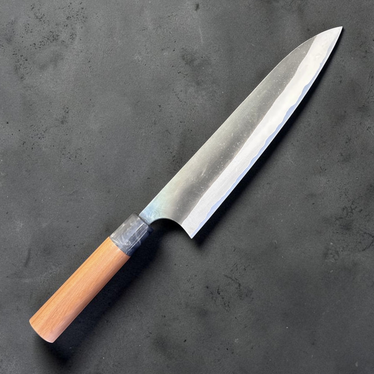 Masakage Mizu Gyuto 210 mm, angled product view showing blade geometry and handle.