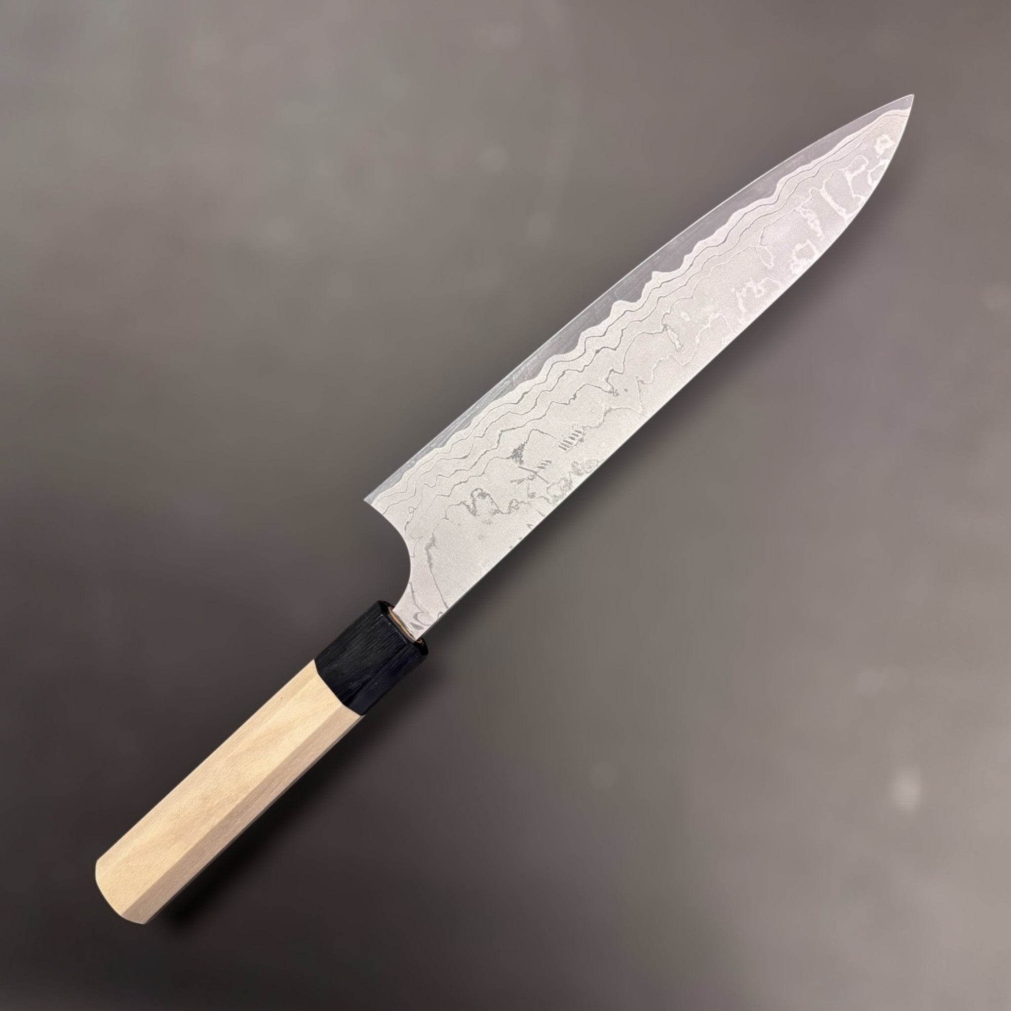Masakage Shimo White #2 Damascus Gyuto 210 mm, left side profile showing flowing Damascus pattern.