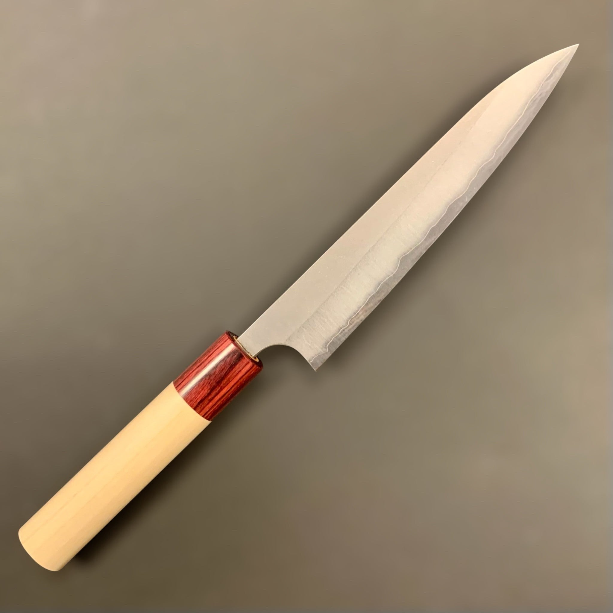 Masakage Yuki Petty 150mm, close-up of the thin blade profile and frosted Nashiji finish.