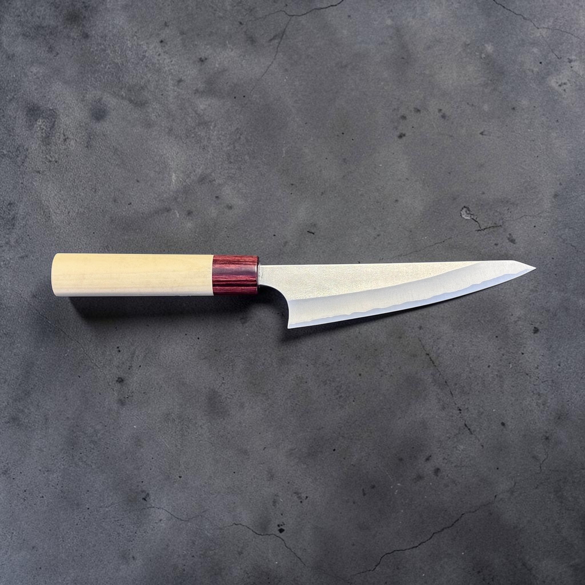 Masakage Yuki White #2 Honesuki 150 mm, Japanese poultry boning knife with hammered stainless cladding and pale wood wa handle.