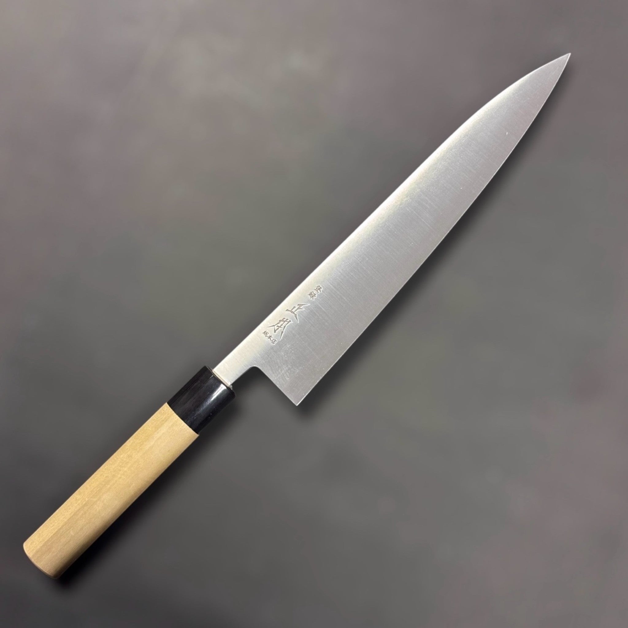 Masamoto SW Swedish Steel Gyuto 240 mm, right face with kanji and blonde wa handle.