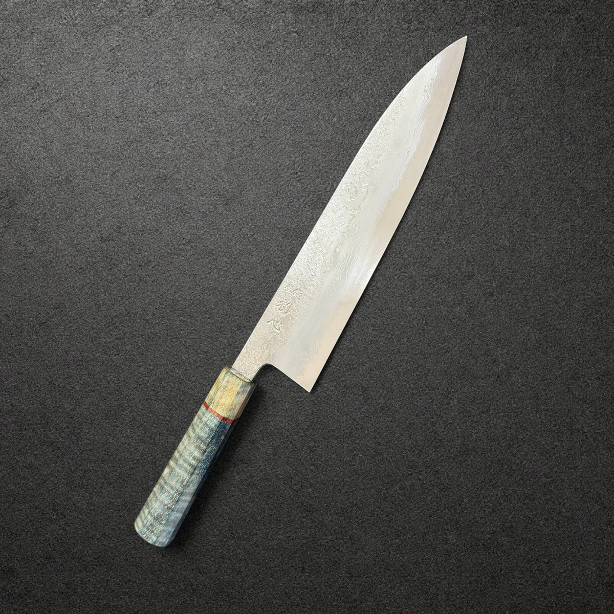Masuda Blue 1 Migaki Damascus Gyuto 240mm with blue-green Prisma handle, angled engraved-side view