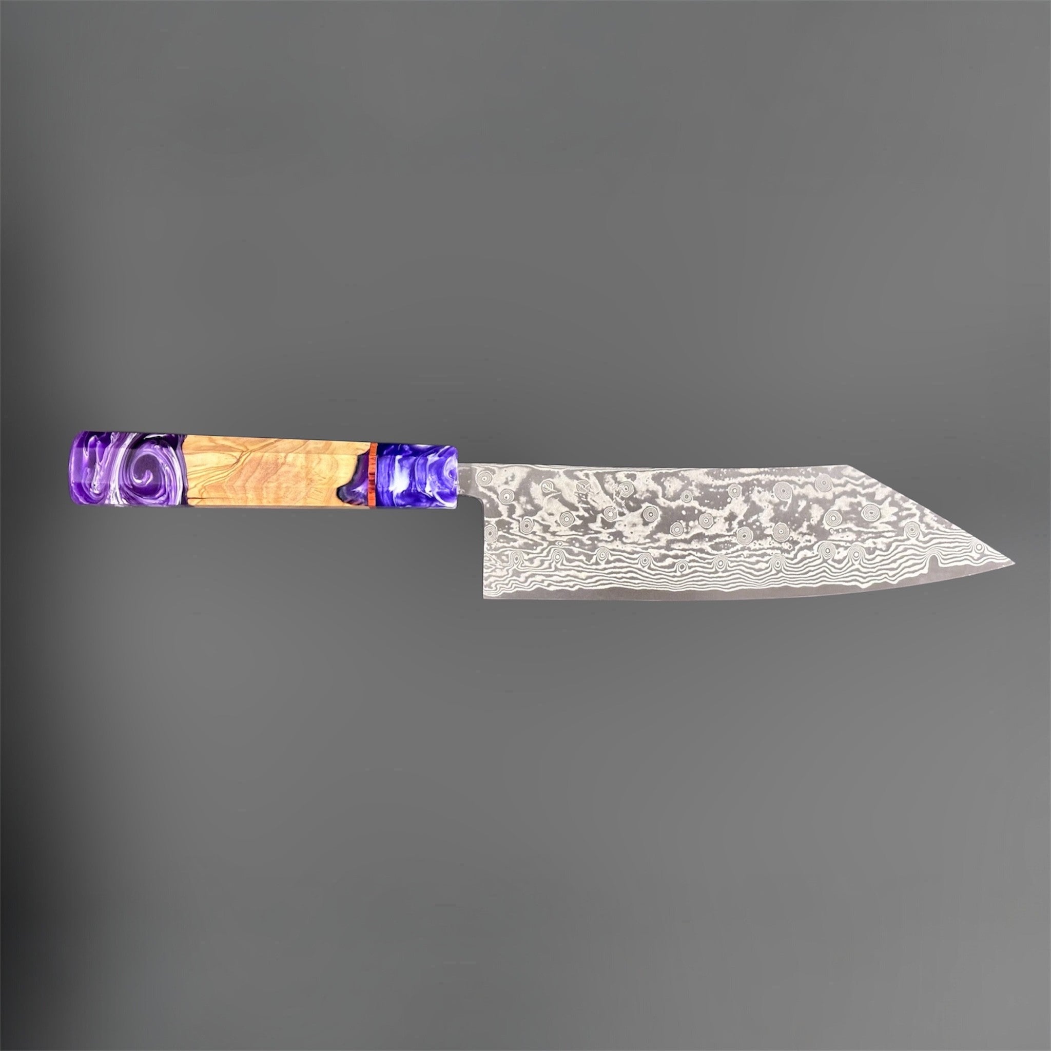 Miyazaki Kajiya ATS-34 Damascus Tsubaki 220 mm with Prisma knife handle, side profile showing the long patterned blade and sculpted purple-and-wood handle.