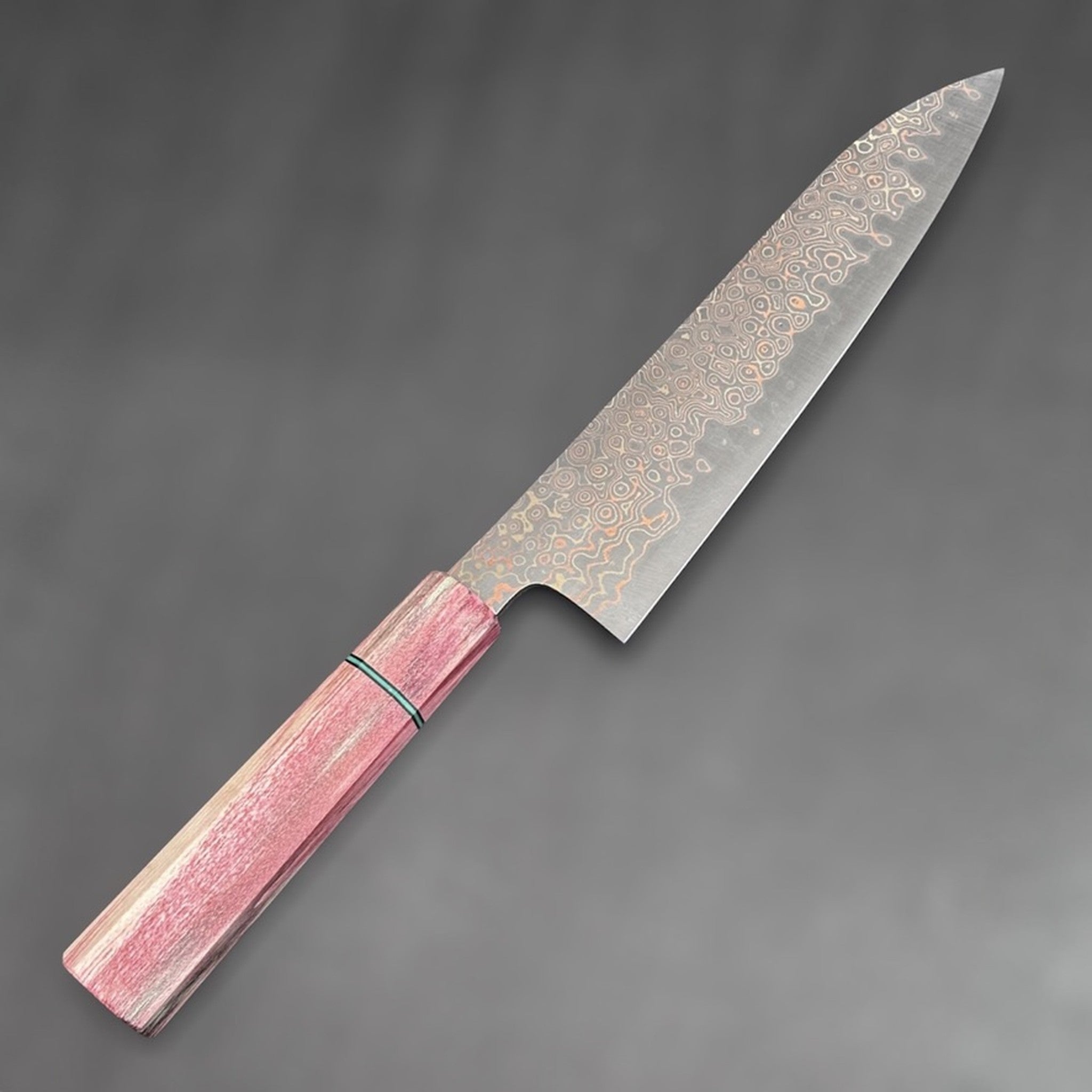 Nigara Anmon Blue #2 Gyuto 210 mm with rainbow prisma handle, sharpened by Naohito Myojin.