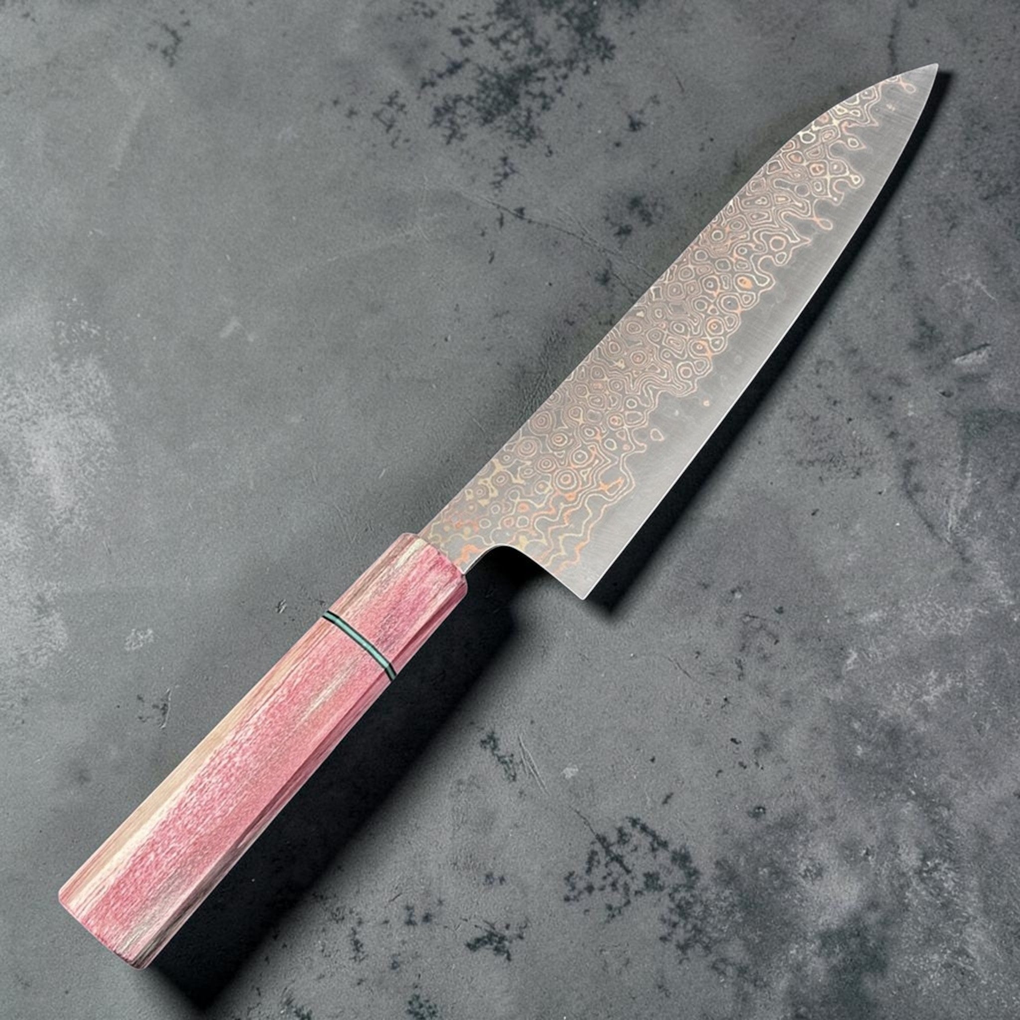 Nigara Anmon Blue #2 Gyuto 210 mm with rainbow prisma handle, sharpened by Naohito Myojin.