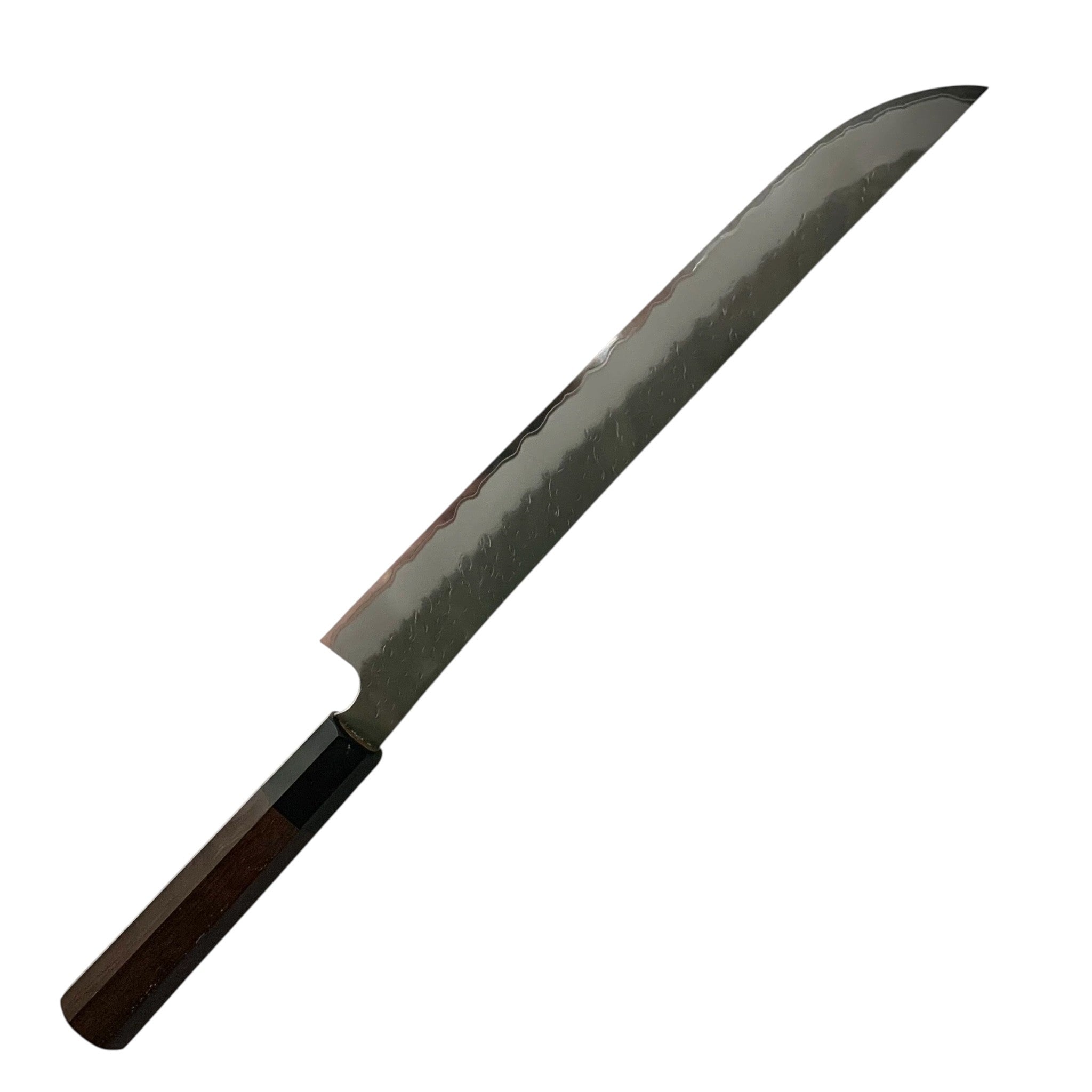 Nigara AS Tsuchime Sakimaru Sujihiki 300 mm — left-side profile highlighting graceful sakimaru tip and kasumi.