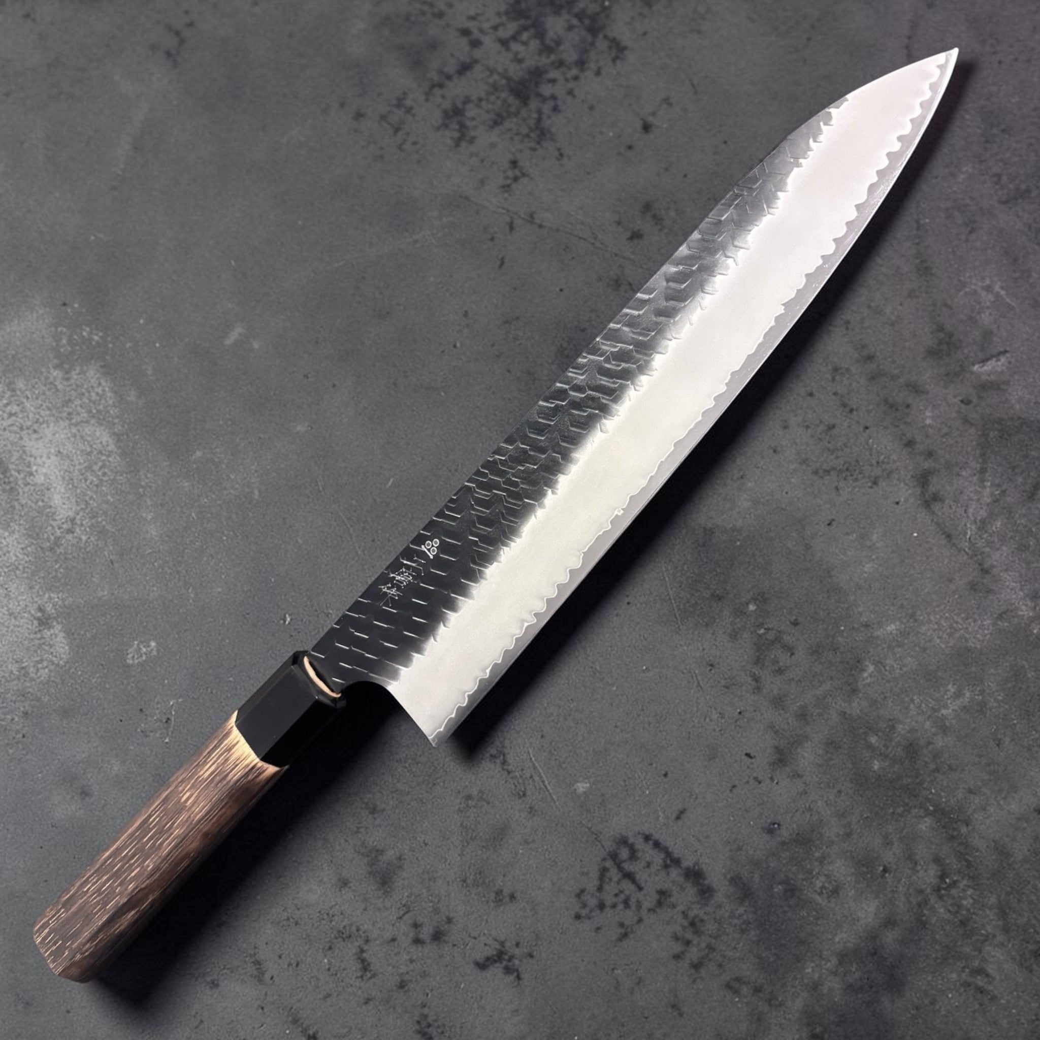 Nigara Hamono SG2 Kurouchi Tsuchime Gyuto 270 mm, reverse side with maker's kanji visible on the blade.