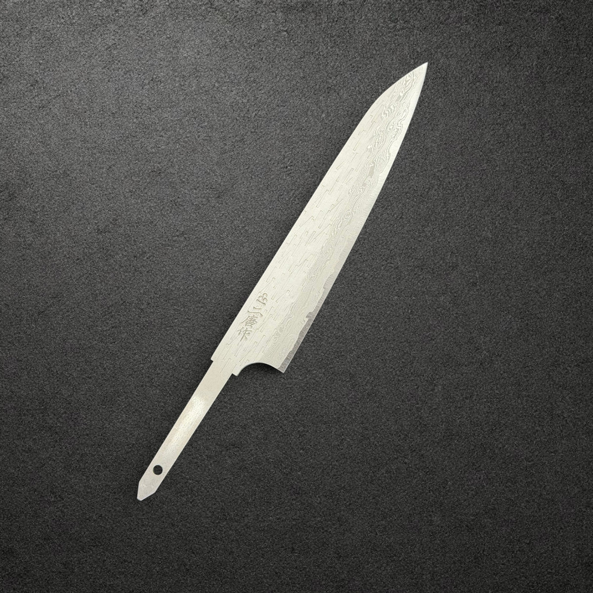 Nigara VG-XEOS Tsuchime Petty 150mm blade only, engraved front angled view with exposed tang