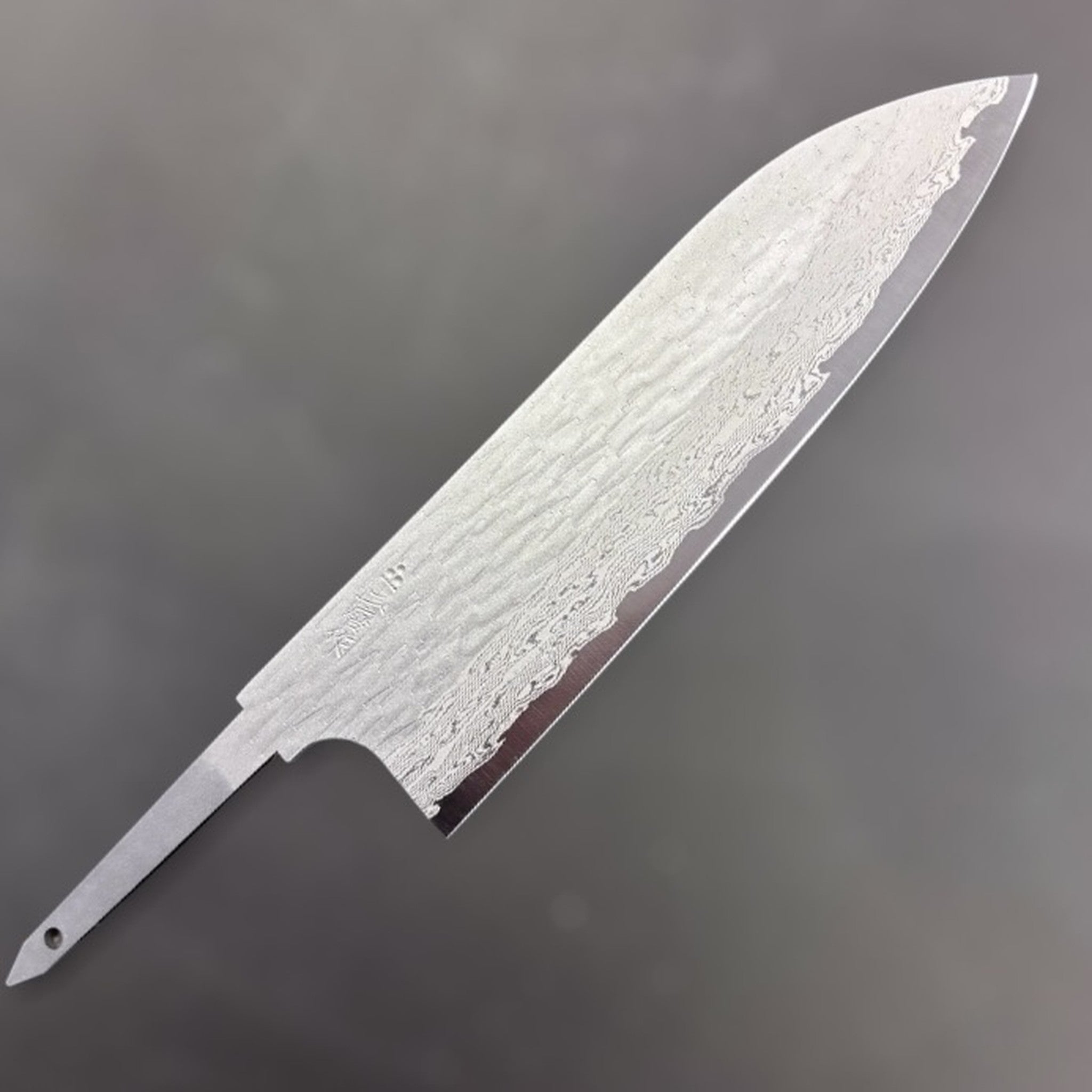 Nigara VG-XOES Damascus Santoku 165 mm blade-only version, close-up of layered Damascus steel pattern.