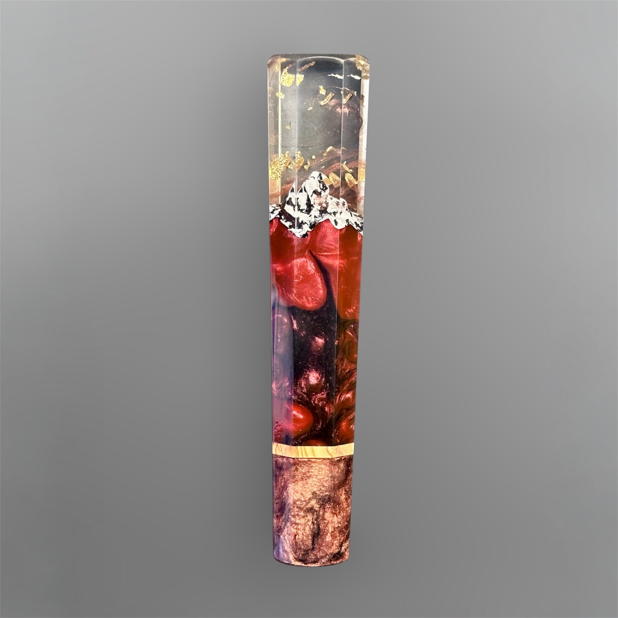 Prisma Knife Handle 6, red and smoky resin wa handle with gold flecks and pale accent spacer.