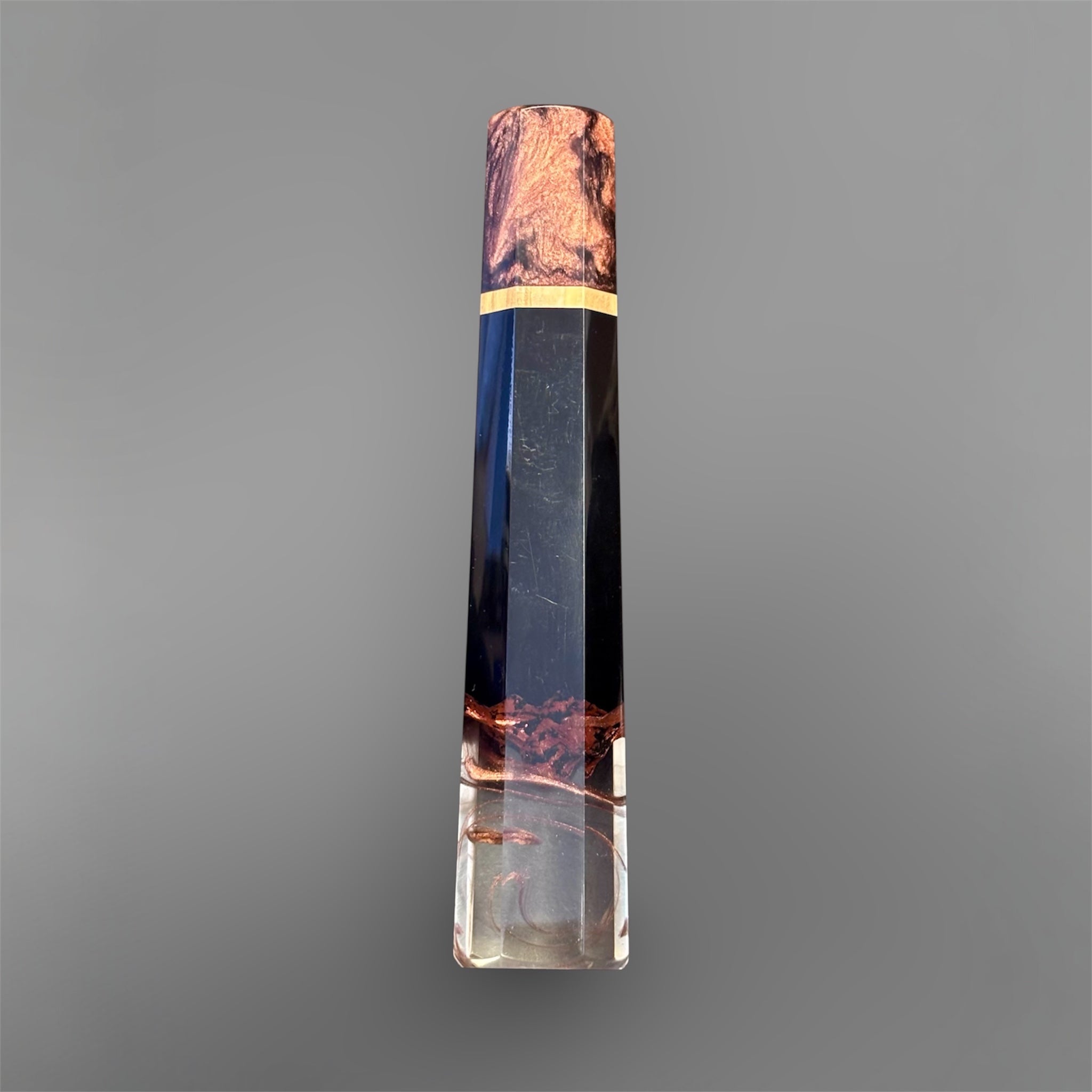 Prisma Knife Handle 8, black resin and copper-toned wood wa handle with clear resin end.