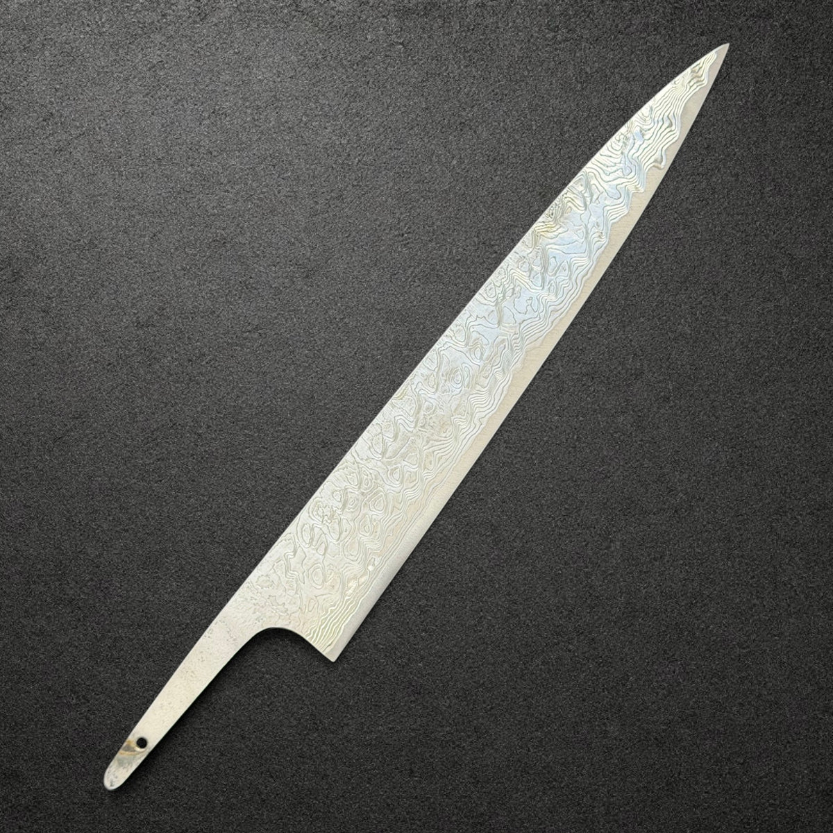 Takeshi Saji R2 Diamond Damascus Sujihiki 240mm, angled view showing the Diamond Damascus blade and exposed tang
