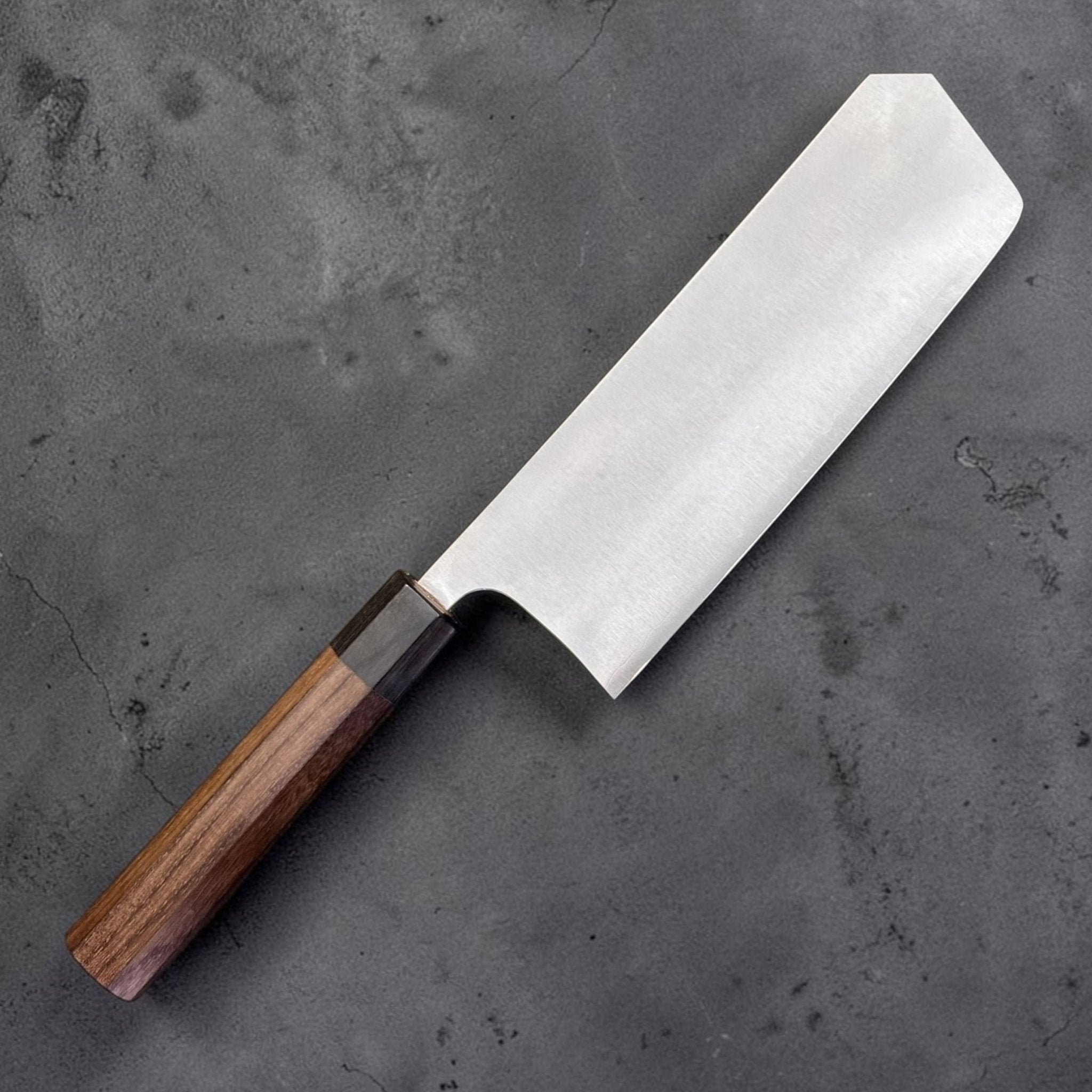 Shibata Koutetsu Chromax Boss Nakiri, angled view showing the clean blade face and octagonal wa handle.