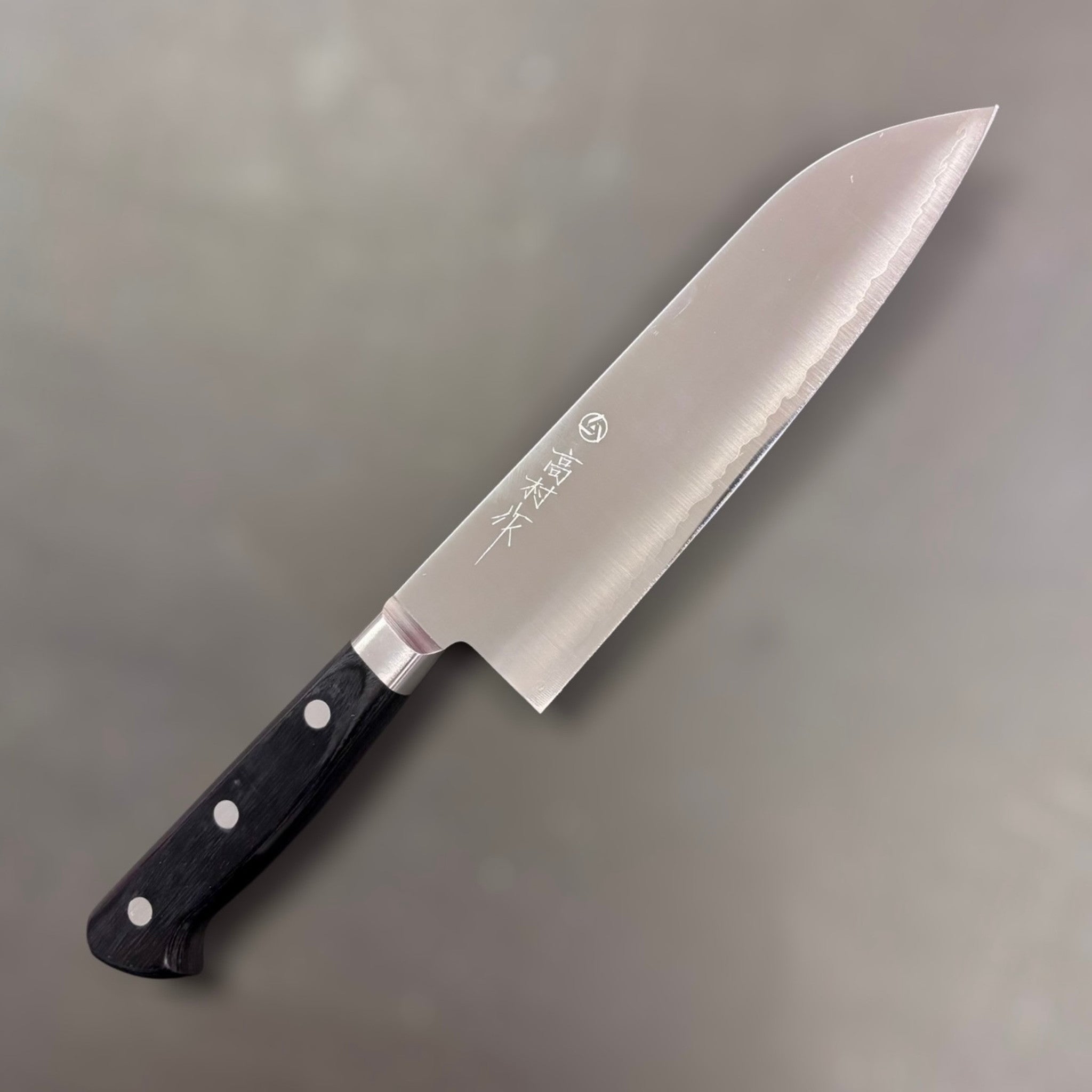 Takamura VG-10 Migaki Santoku 170 mm, left side with kanji etch; satin migaki finish.