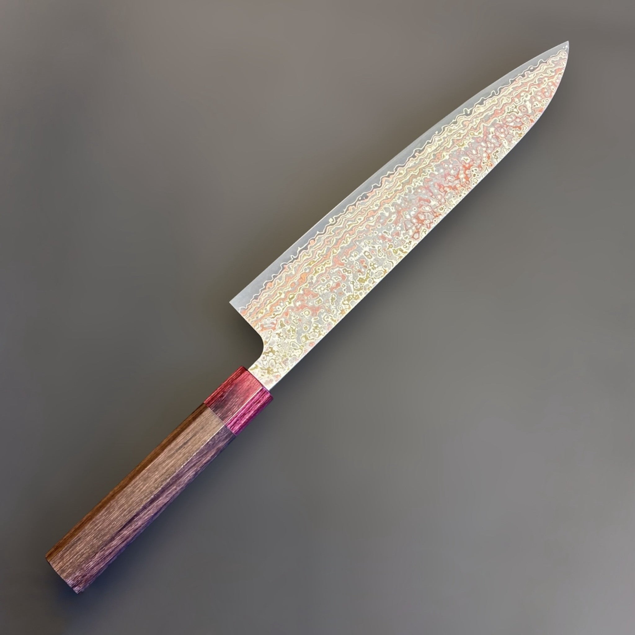 Takeshi Saji VG-10W Nashiji Rainbow Gyuto 240 mm, left side profile of the full knife with rainbow Damascus blade and octagonal wood handle.