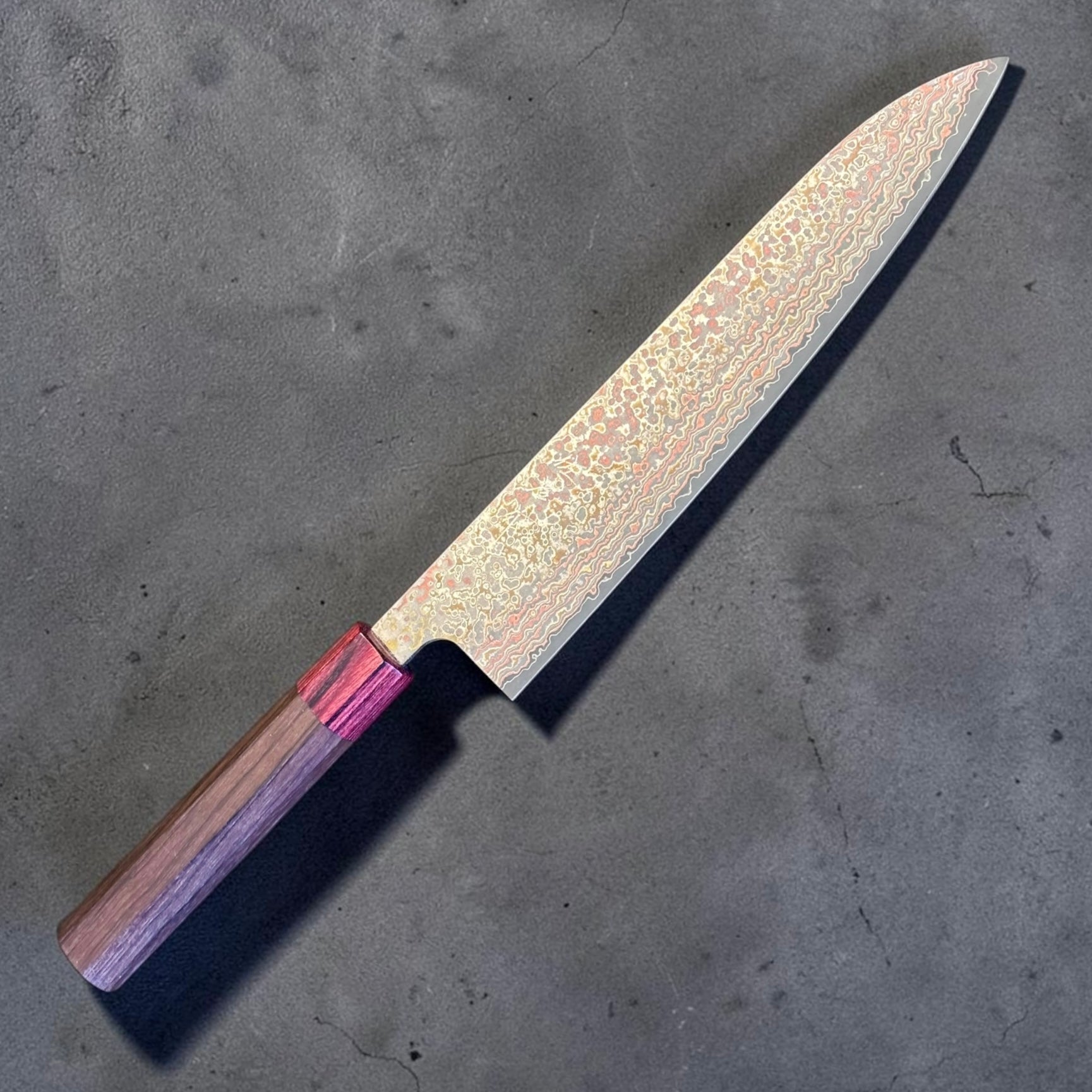 Takeshi Saji VG-10W Nashiji Rainbow Gyuto 240mm with rosewood and red octagonal wa handle, full knife diagonal view.