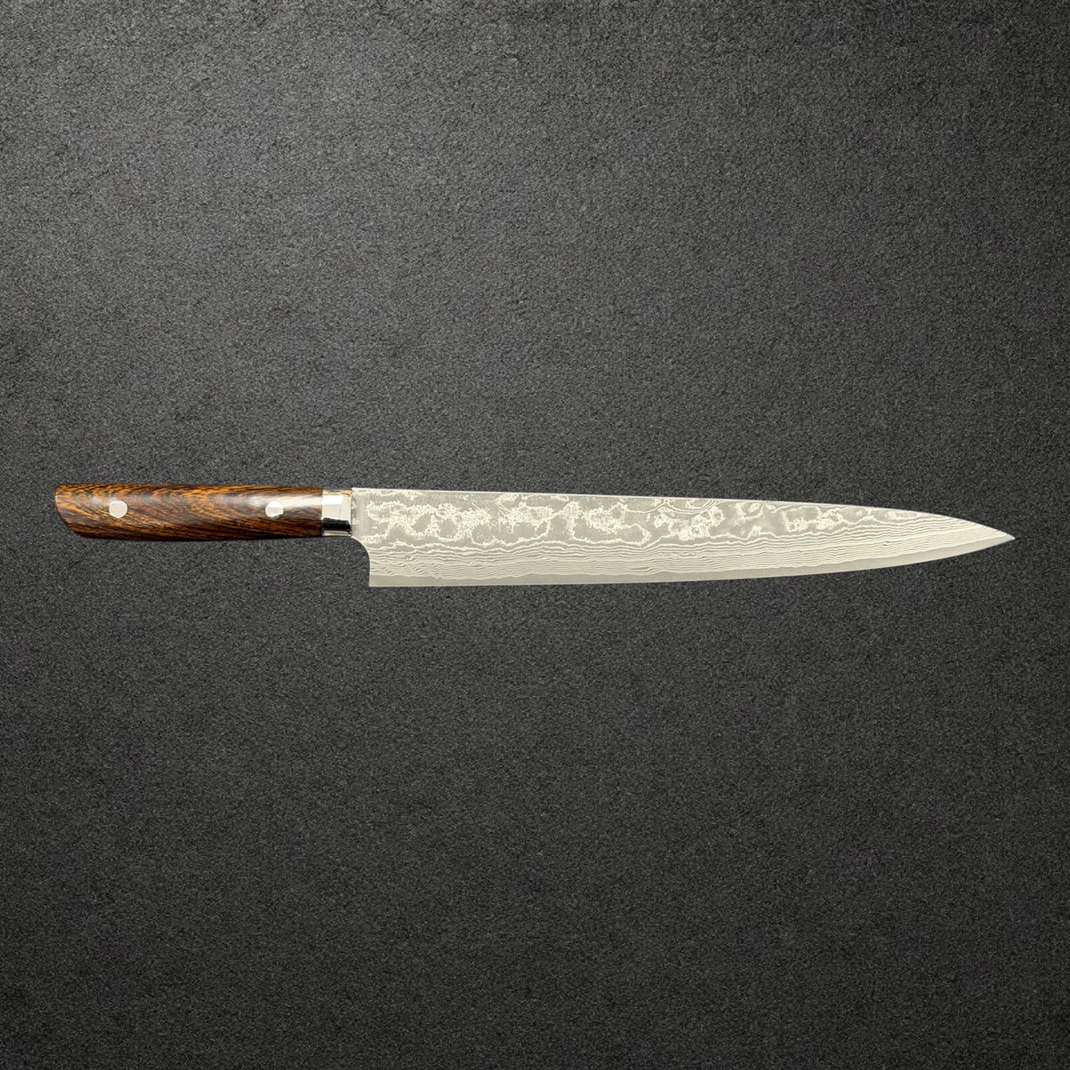 Full side profile of the Takeshi Saji VG-10 Kurozome Sujihiki 270mm with ironwood handle