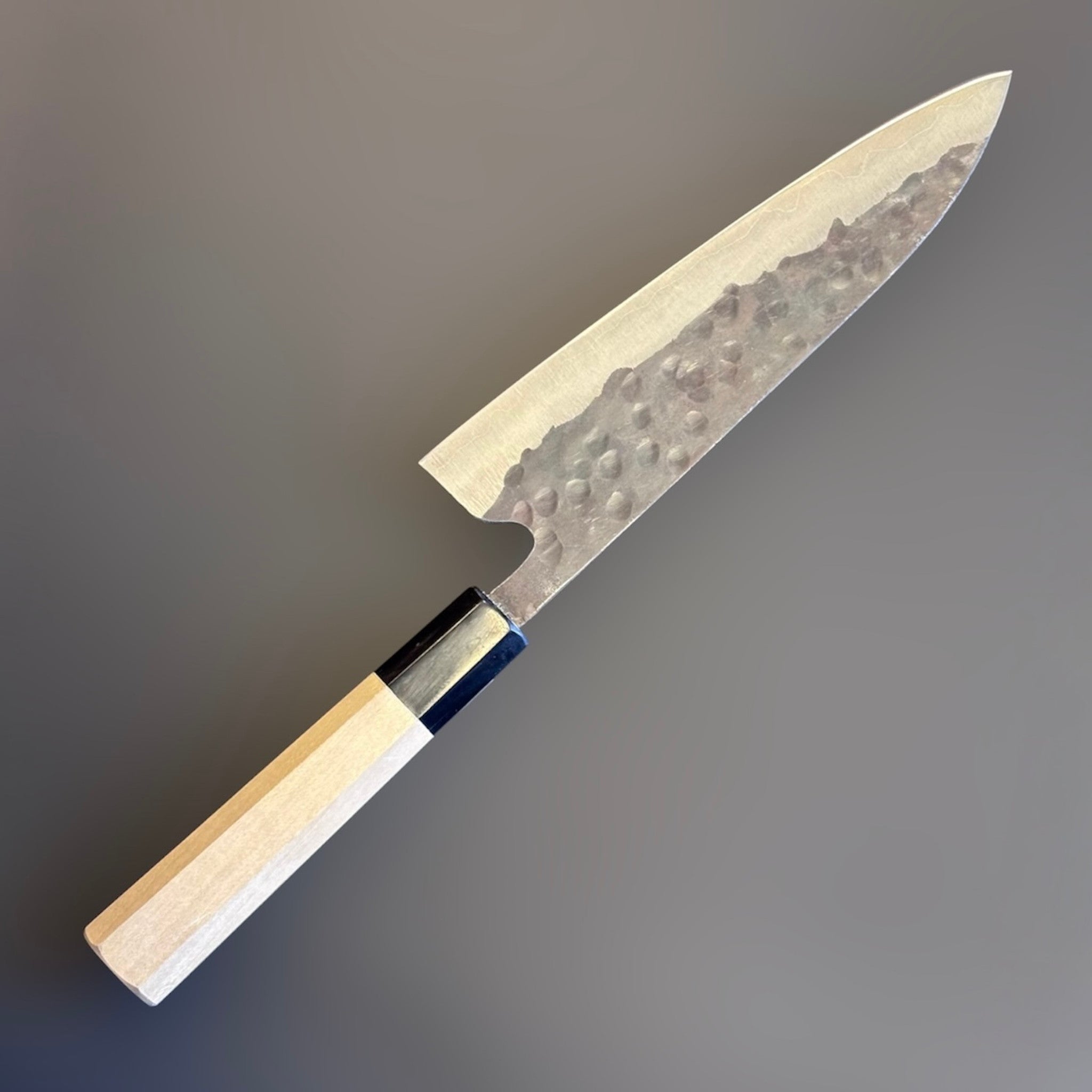 Teruyasu Fujiwara Denka Gyuto 180 mm with wa handle, full left side profile on neutral gray background.